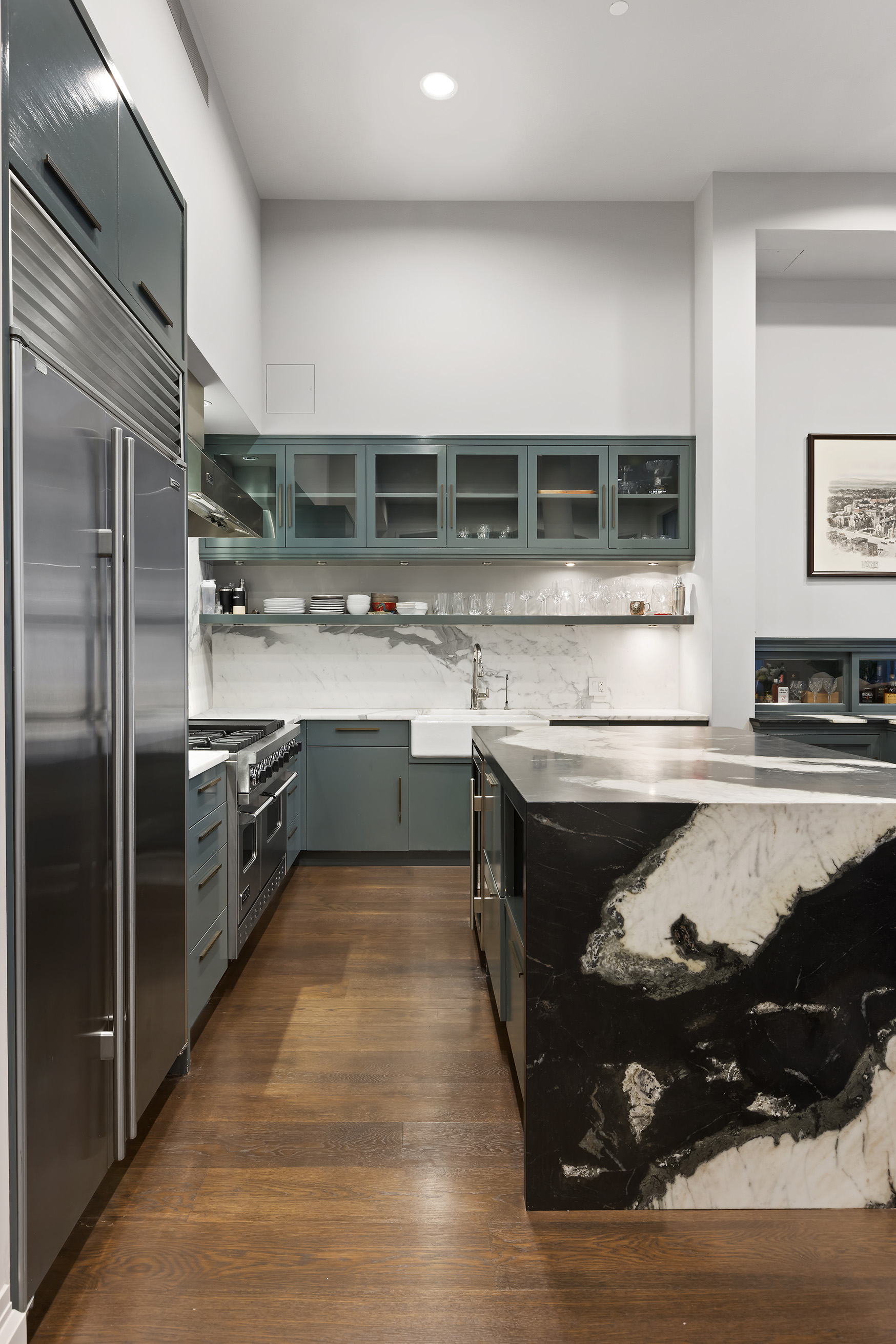 114 Liberty Street, Unit 2A Manhattan, NY 10006 - Photo 6 of 17 a kitchen with stainless steel appliances granite countertop a stove a sink and a refrigerator