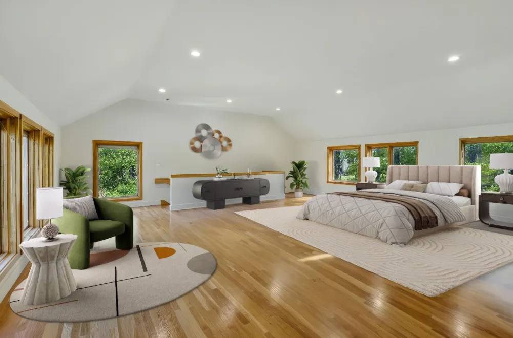 a spacious bedroom with a bed a couch and a large window