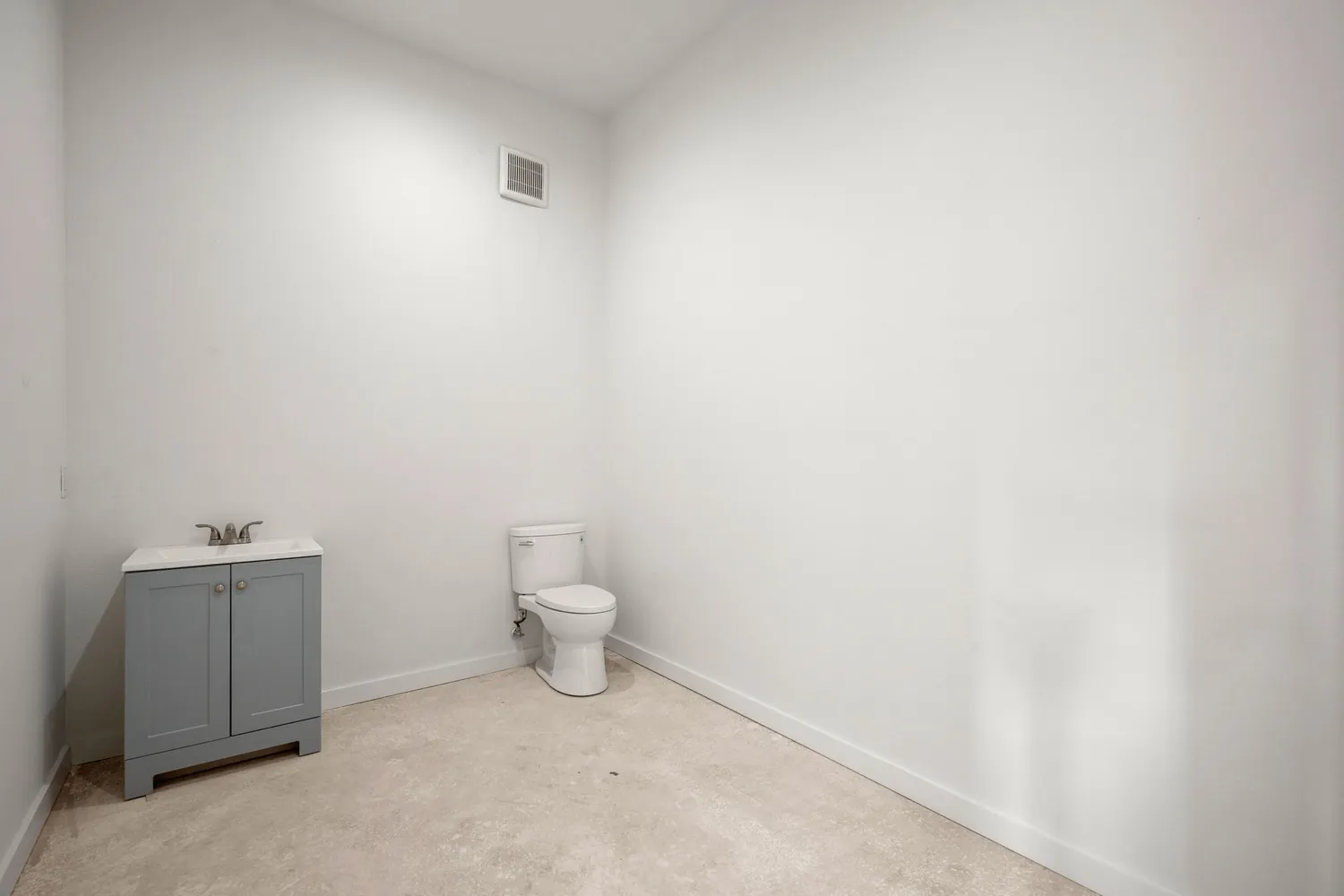 a bathroom with a toilet