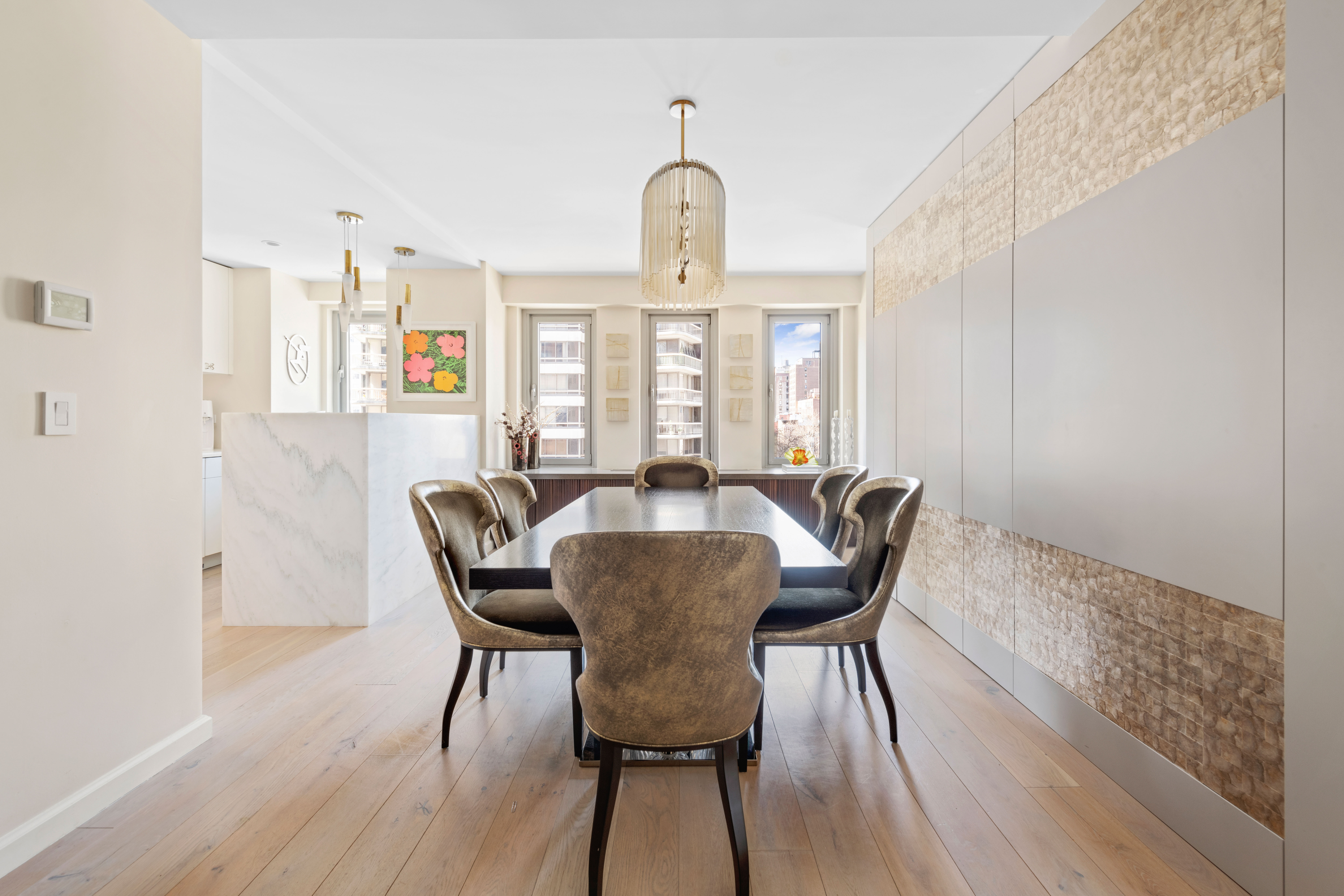 200 East 62nd Street, Unit 5A Manhattan, NY 10065 - Photo 5 of 25 a view of a dining room with furniture window and wooden floor