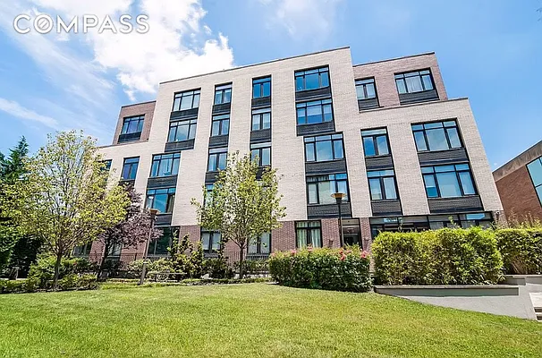 125 North 5th Street, Unit 2E Brooklyn, NY 11249 - Photo 10 of 11 a front view of a multi story building