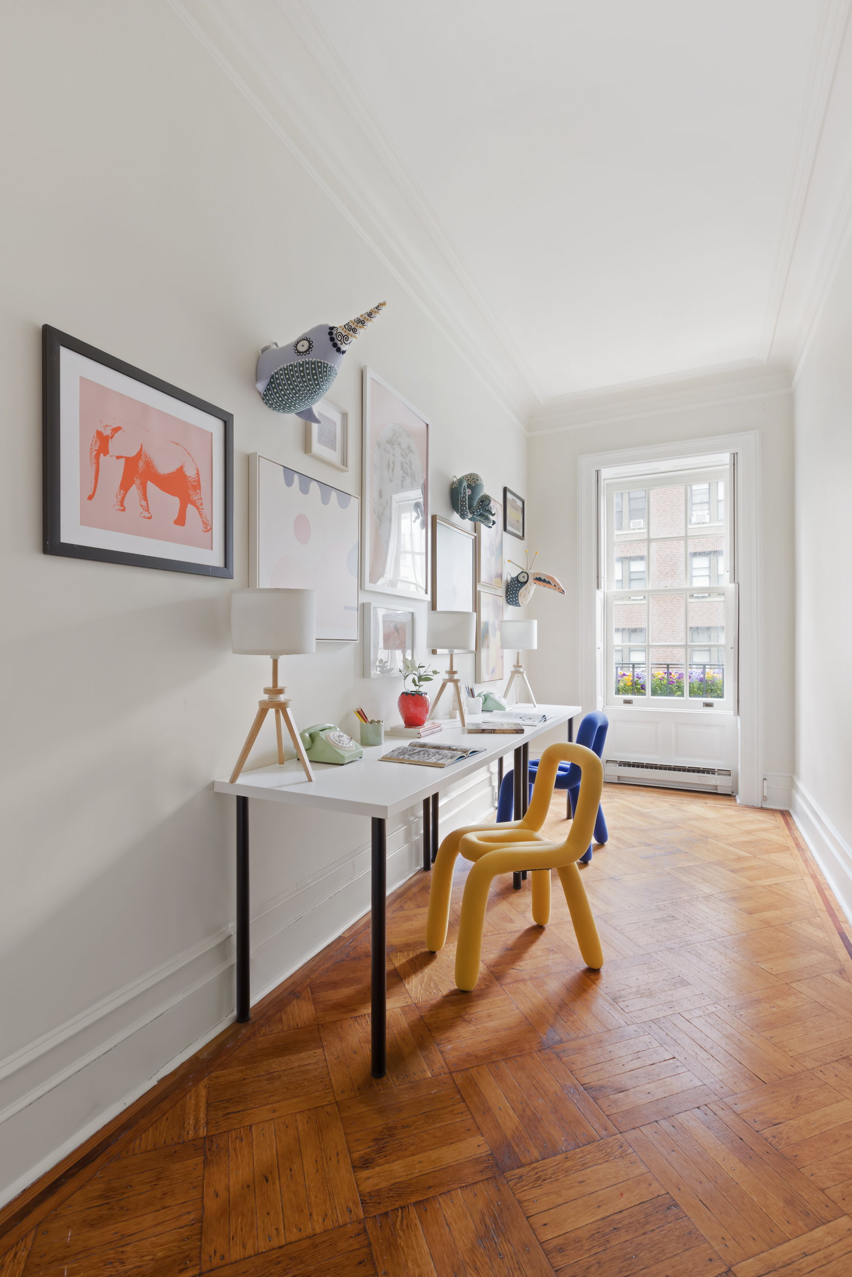 37 West 70th Street Manhattan, NY 10023 - Photo 31 of 41 a view of a workspace with furniture and a window