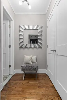 a room with furniture and a wooden floor