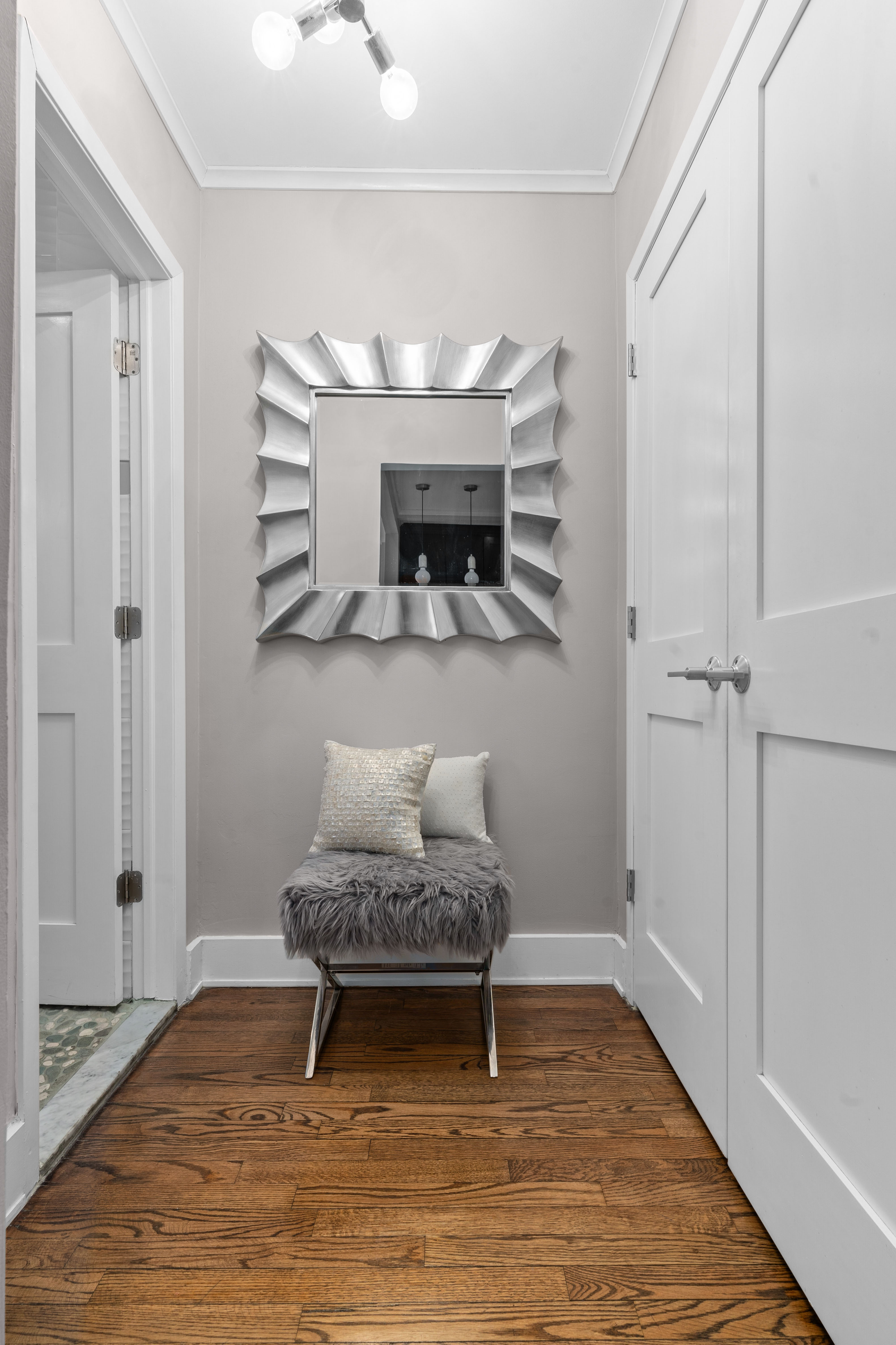 61 Oliver Street, Unit 4P Brooklyn, NY 11209 - Photo 7 of 11 a room with furniture and a wooden floor