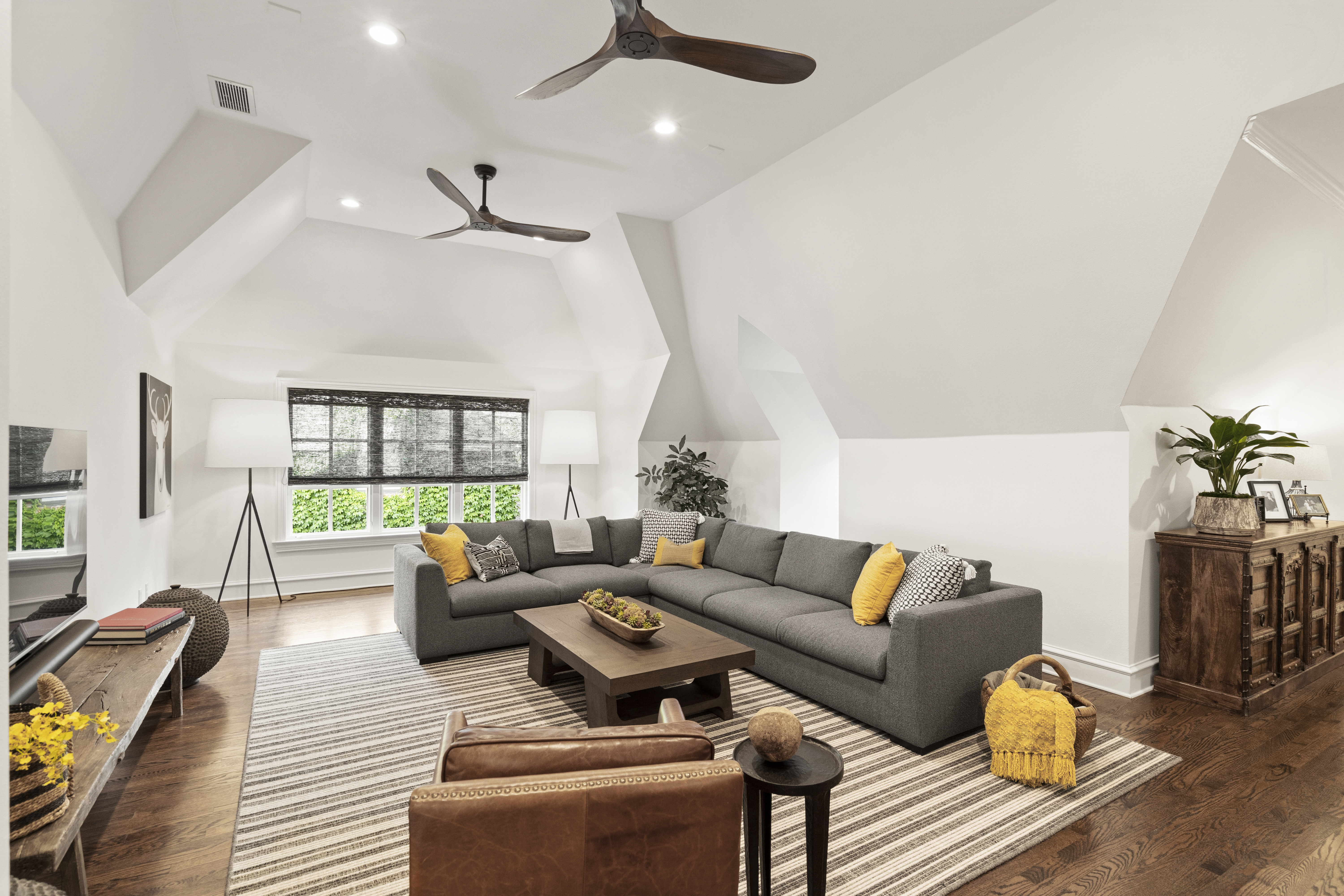 6607 Meadow Road Dallas, TX 75230 - Photo 25 of 32 a living room with furniture and a large window