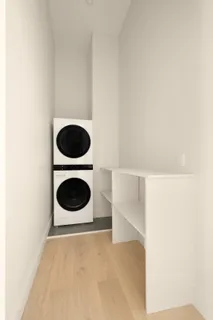 a view of a storage & utility room with a sink