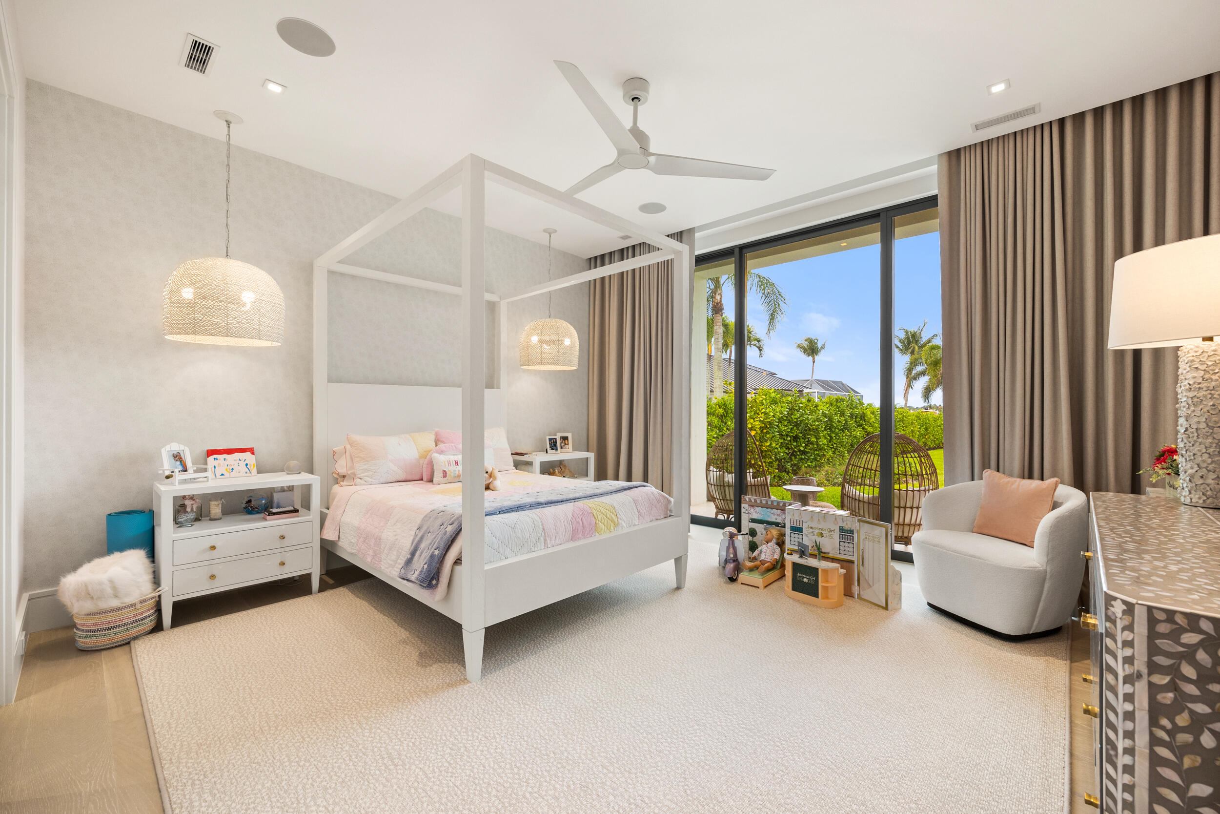 5695 Pennock Point Road Jupiter, FL 33458 - Photo 53 of 77 a bed room with furniture and a large window