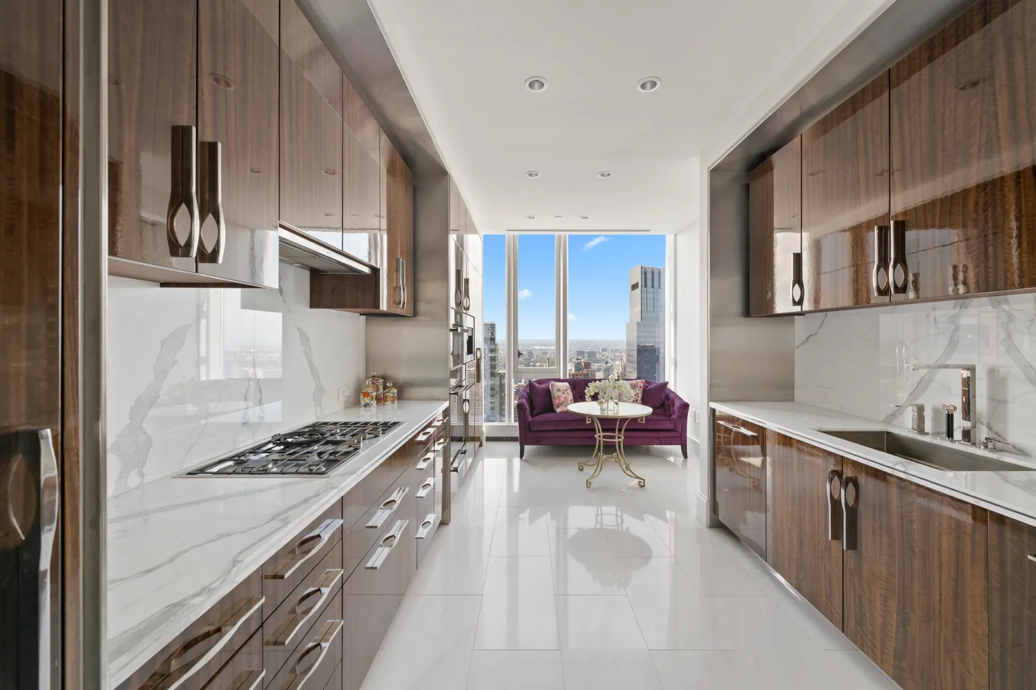 a kitchen with a stove a sink and cabinets