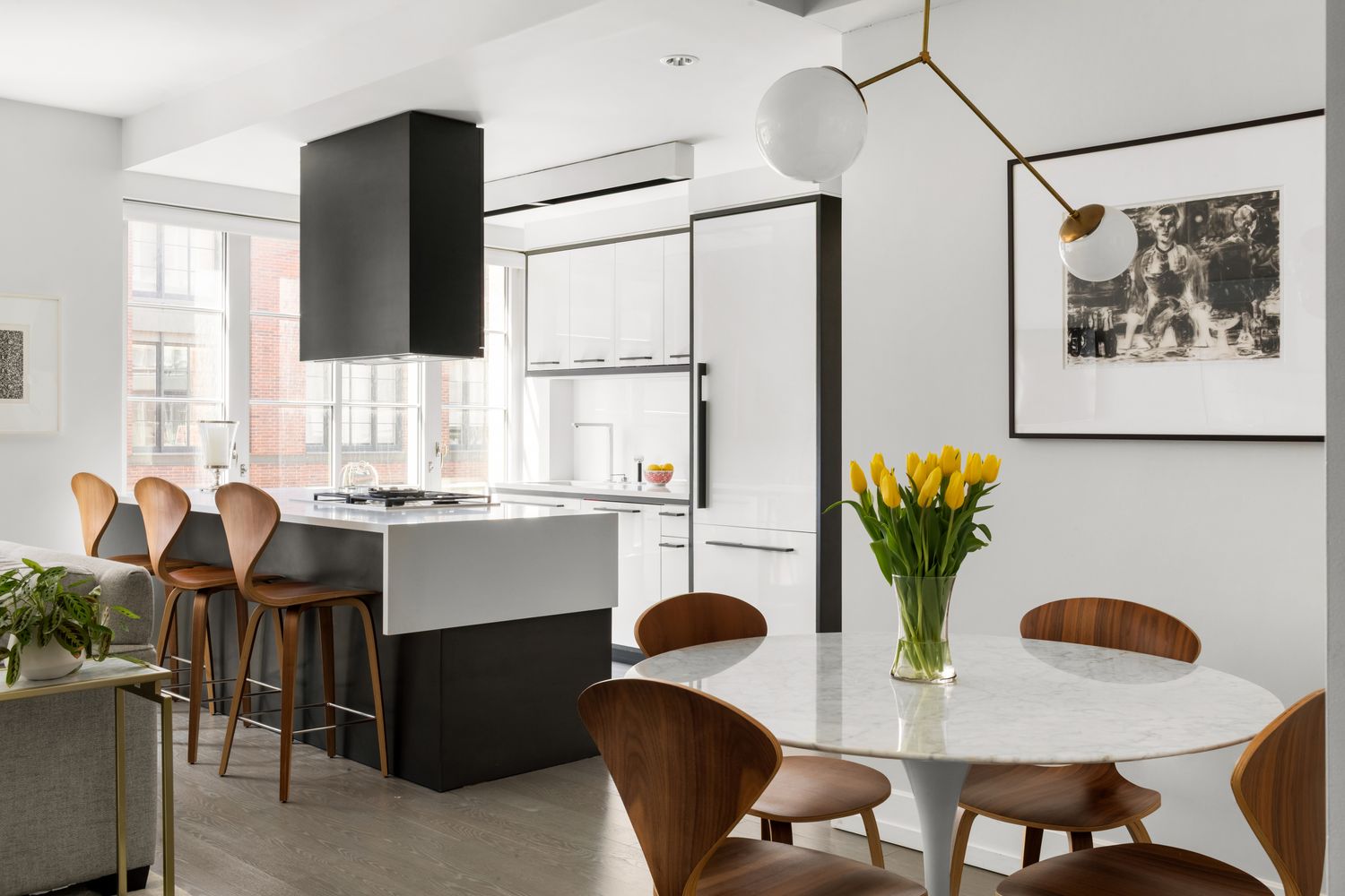70 Charlton Street, Unit 19D Manhattan, NY 10014 - Photo 3 of 14 a dining room with furniture and window