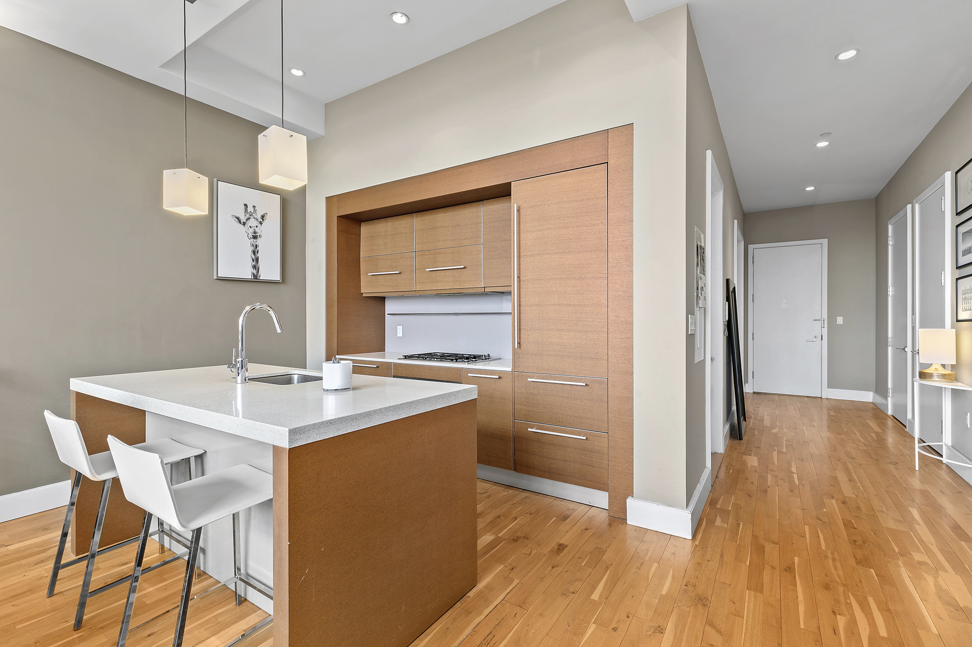 360 Furman Street, Unit 616 Brooklyn, NY 11201 - Photo 5 of 6 a view of a dining room with furniture a chandelier and wooden floor