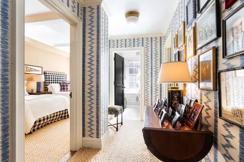 a view of a living room and workspace