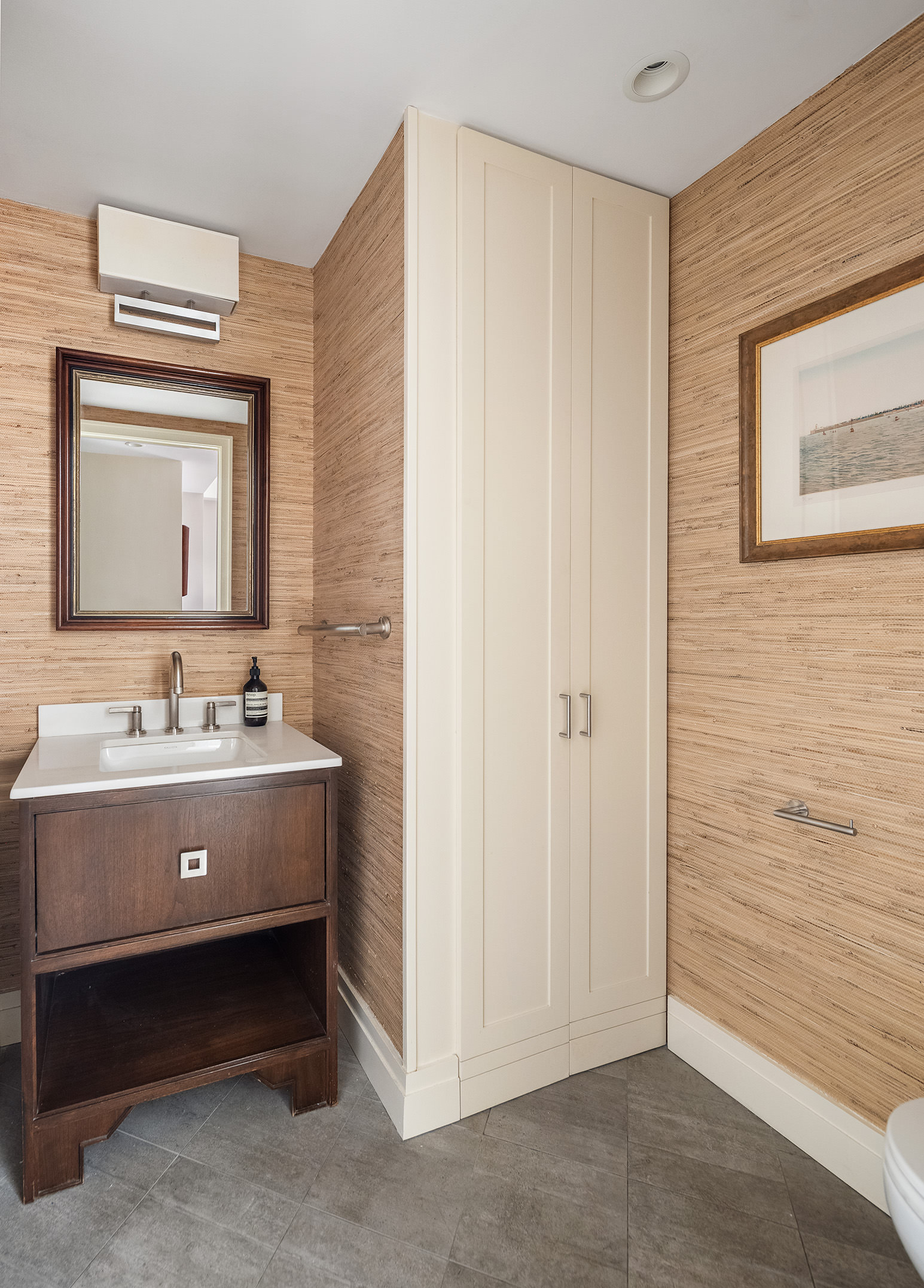450 West End Avenue, Unit 3B Manhattan, NY 10024 - Photo 12 of 13 a bathroom with a sink and a mirror