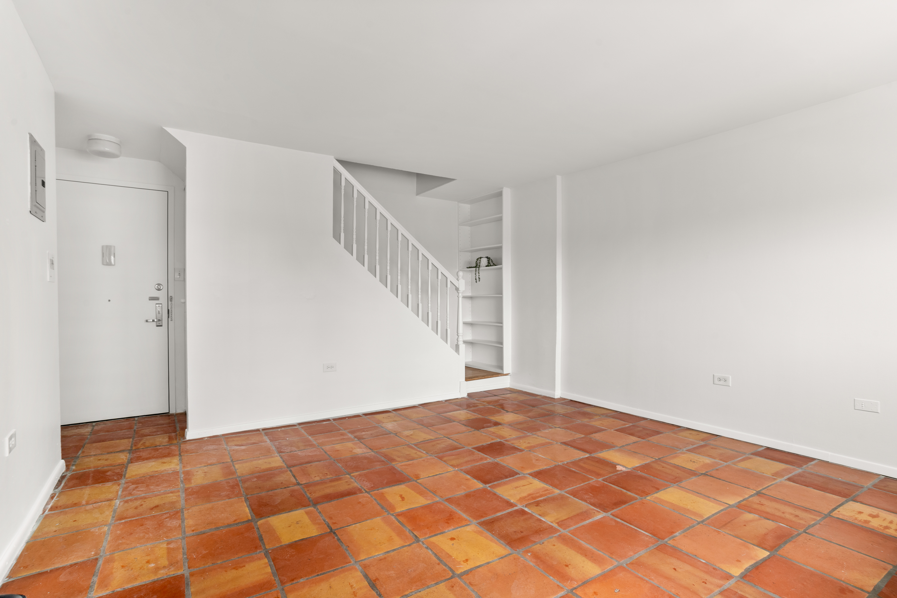 609 Columbus Avenue, Unit 14E Manhattan, NY 10024 - Photo 11 of 24 a view of a big room with a fireplace
