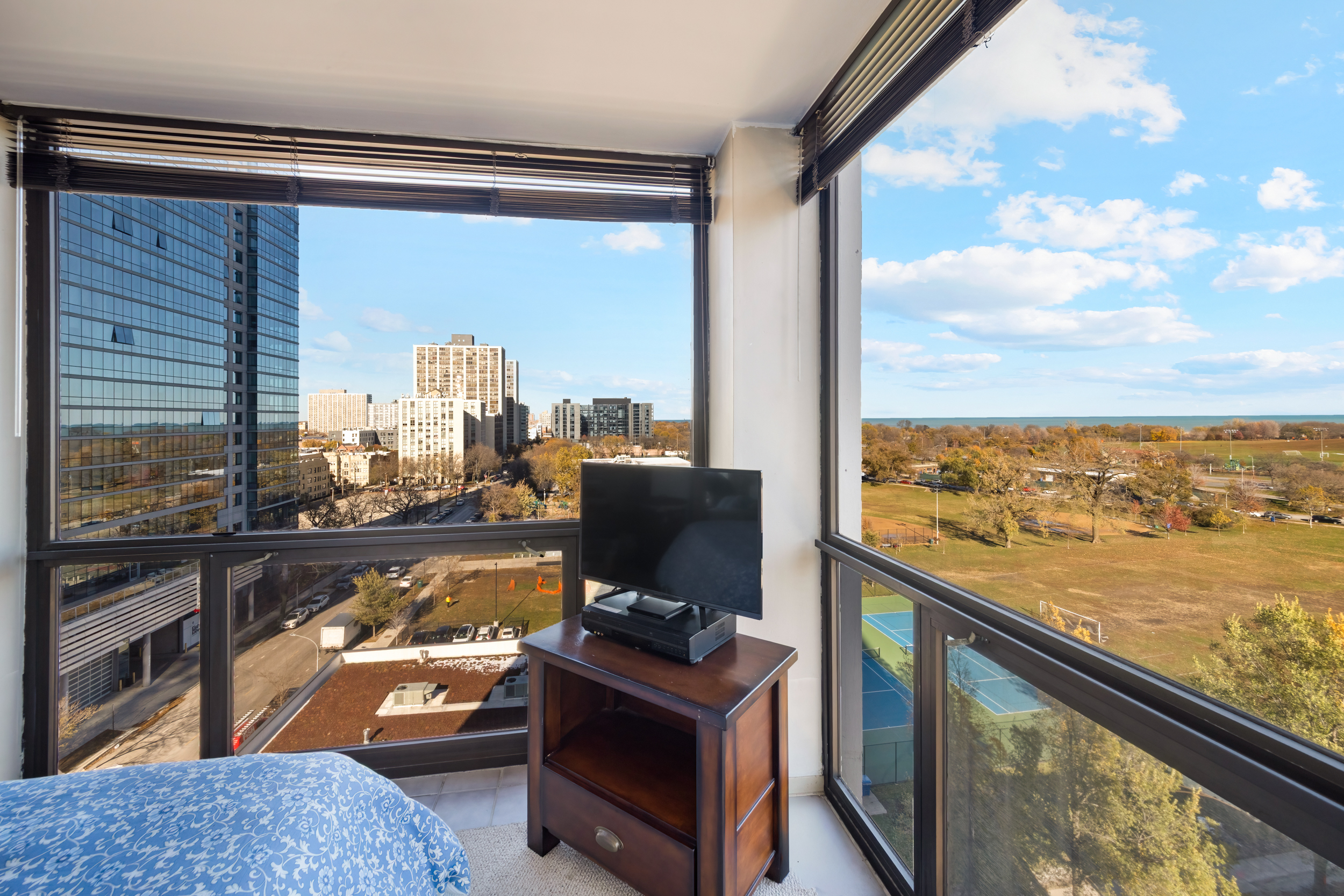 4343 North Clarendon Avenue, Unit 1016 Chicago, IL 60613 - Photo 26 of 35 a view of a lake from a window