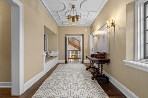 a bedroom with bed and wooden floor