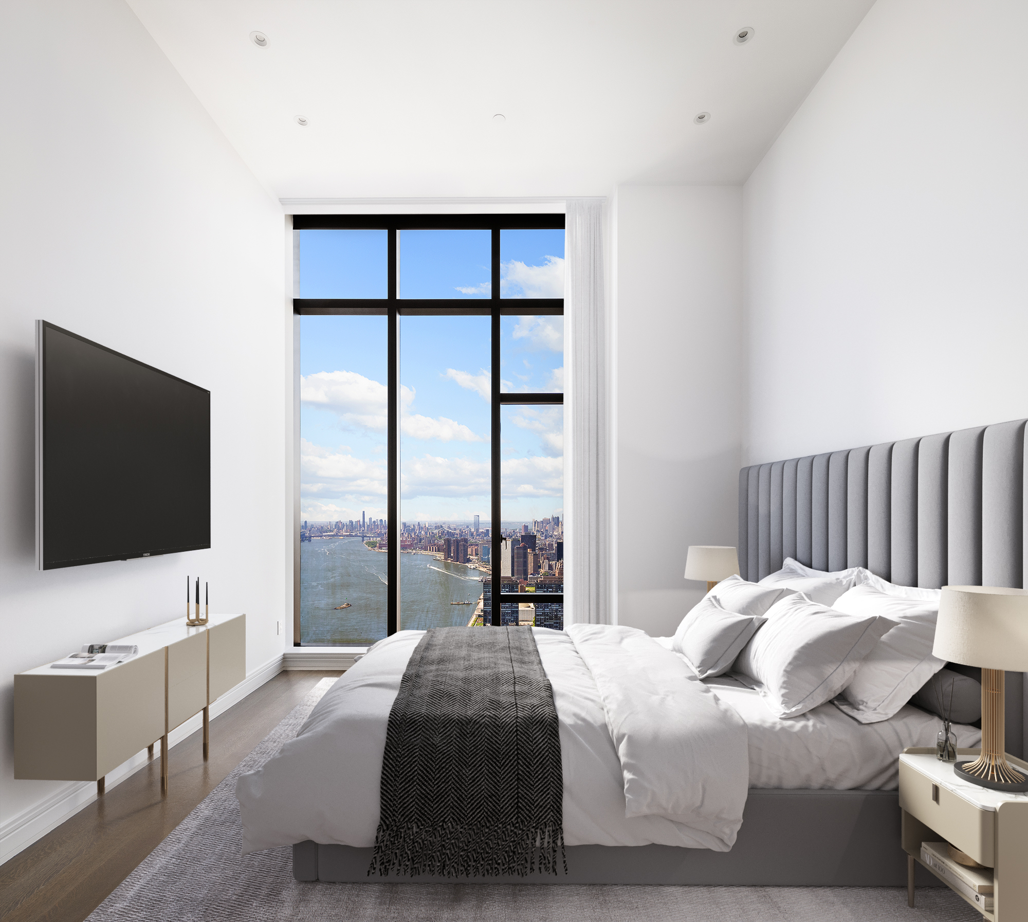 430 East 58th Street, Unit PH72 Manhattan, NY 10022 - Photo 12 of 26 a bedroom with a bed and a flat screen tv