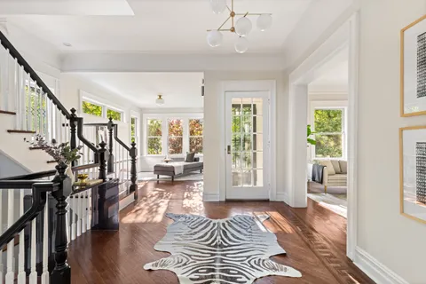 a spacious bedroom with a large bed and a window