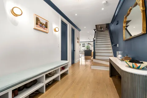 a hallway with wooden floor