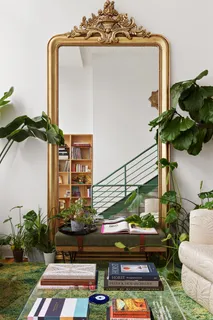a view of balcony with potted plants