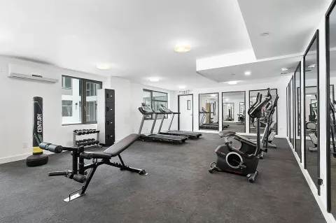 a view of a room with gym equipment