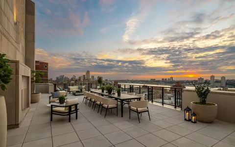 a view of a terrace with furniture