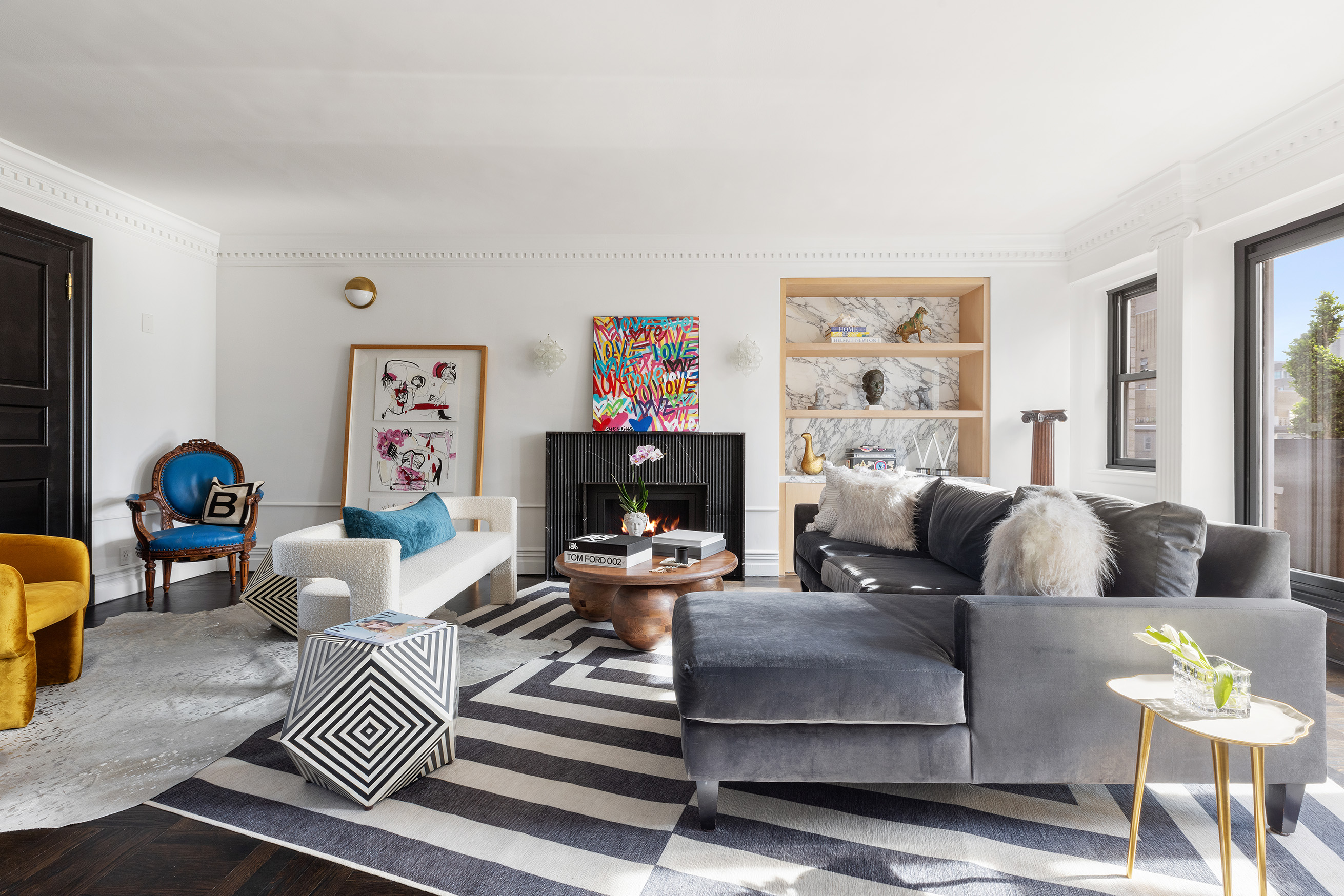 175 East 62nd Street, Unit PHA Manhattan, NY 10065 - Photo 1 of 18 a living room with fireplace furniture and a window