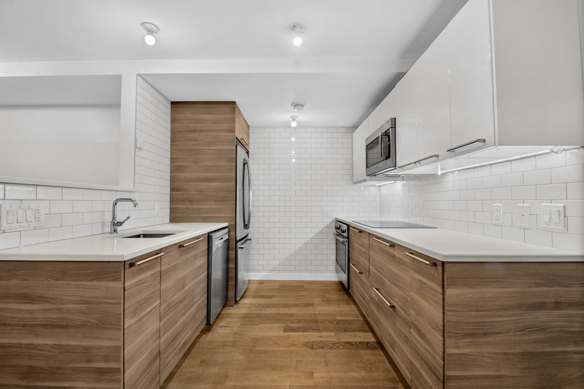 435 Putnam Avenue, Unit GARDEN Brooklyn, NY 11221 - Photo 4 of 11 a kitchen with stainless steel appliances granite countertop a sink and a stove