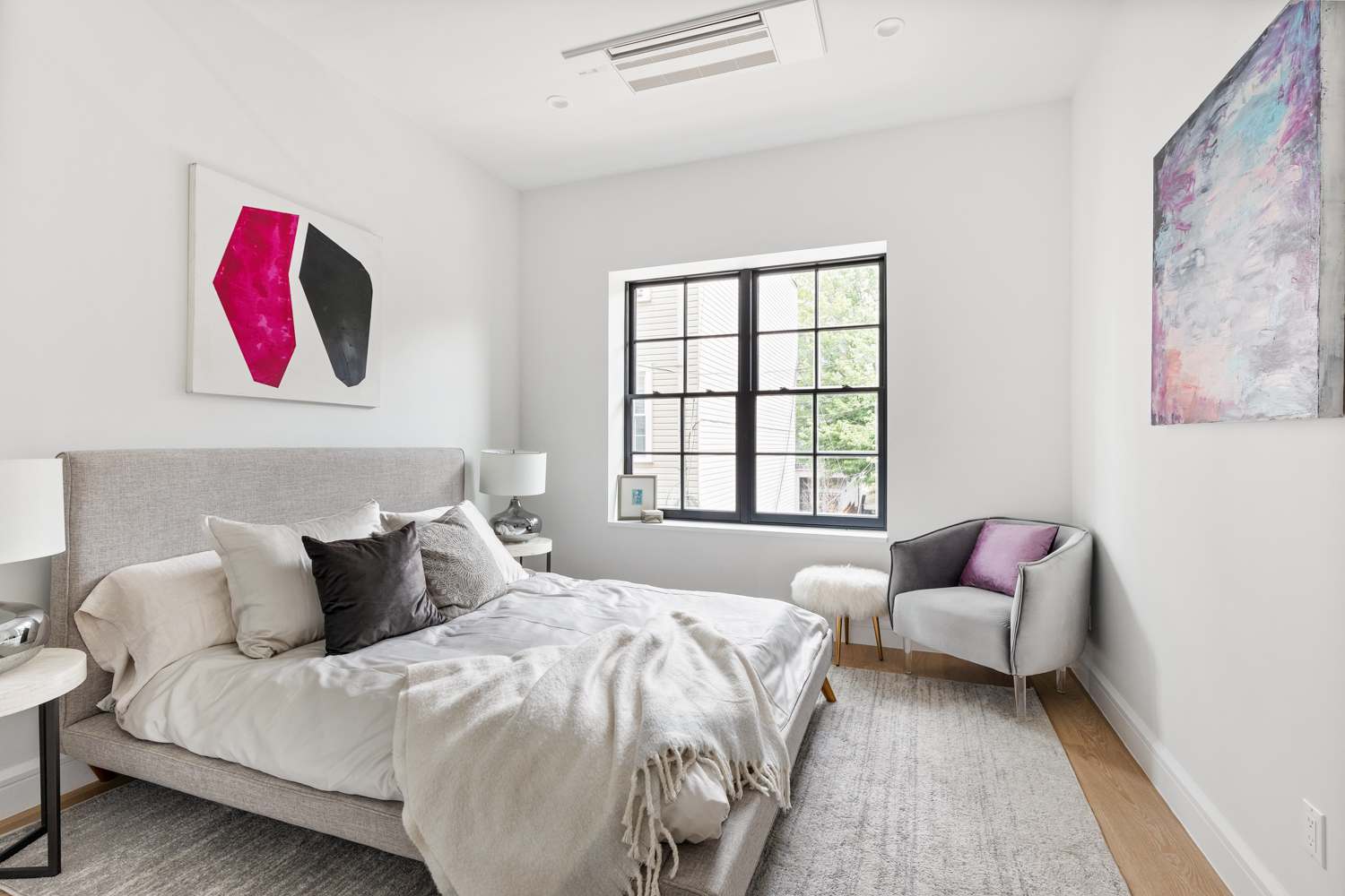 243 North 5th Street, Unit 2B Brooklyn, NY 11211 - Photo 8 of 14 a bedroom with a bed and a couch