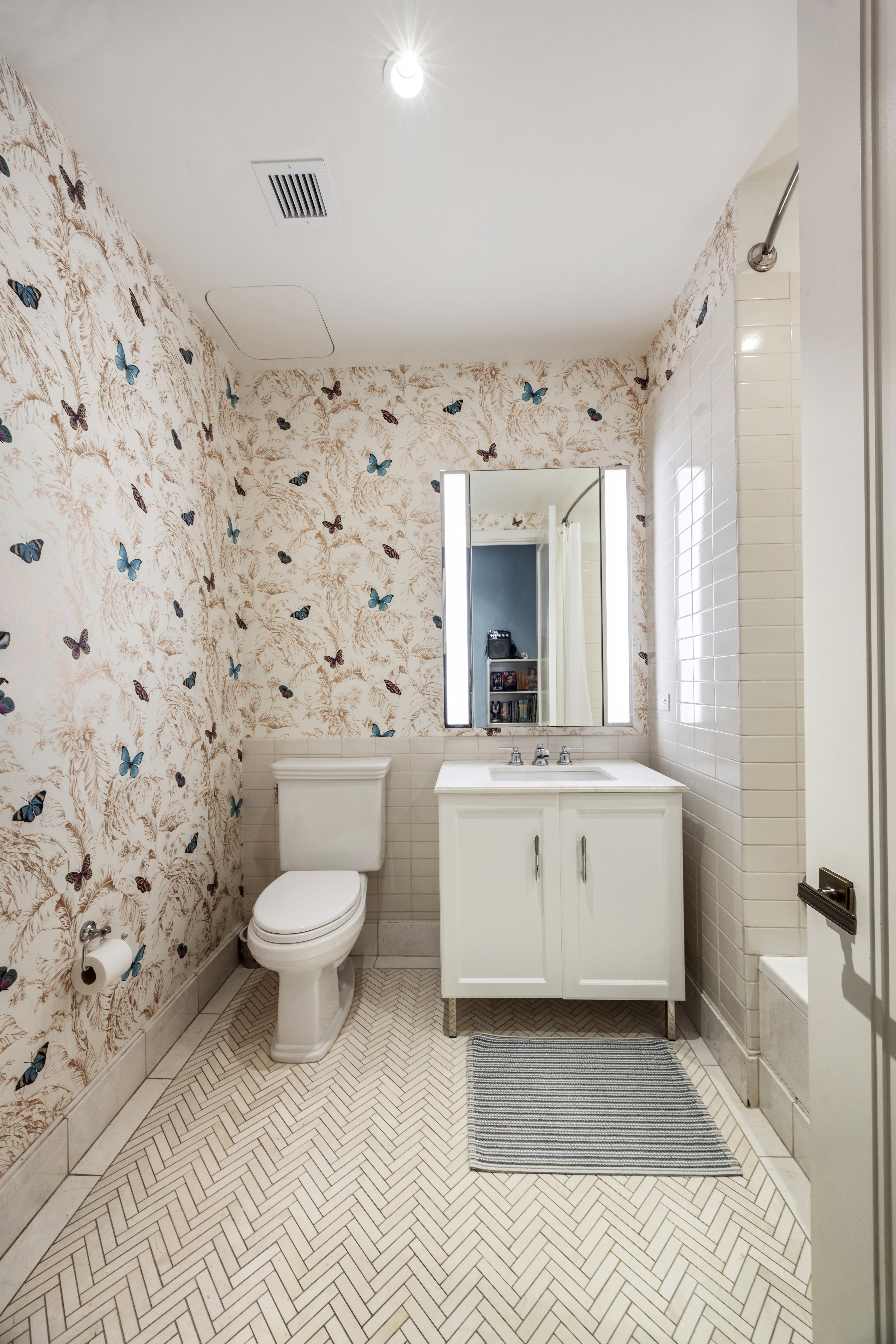 100 Barclay Street, Unit 13G Manhattan, NY 10007 - Photo 11 of 26 a bathroom with a sink a toilet and a bathtub