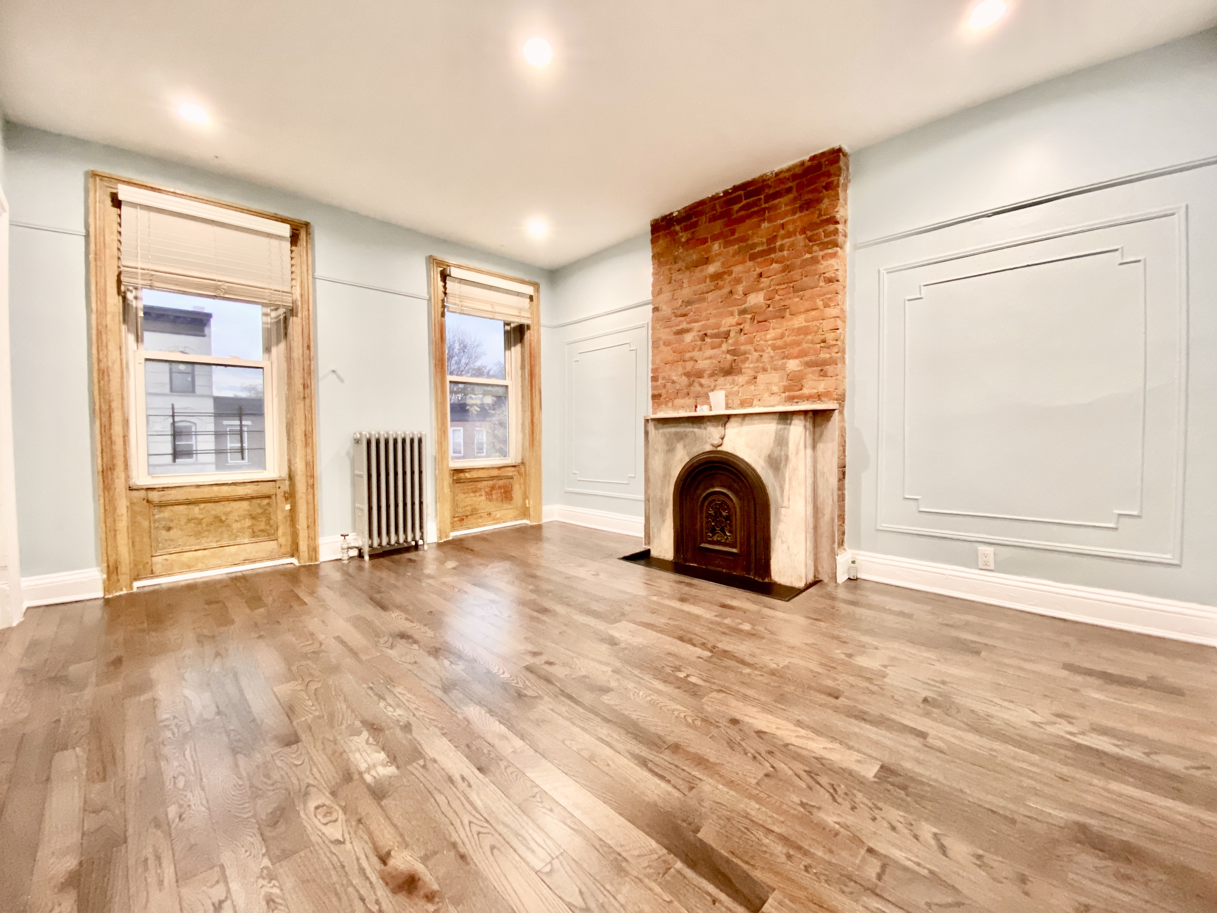 398 Decatur Street, Unit 3 Brooklyn, NY 11233 - Photo 6 of 9 a view of livingroom with washer and dryer