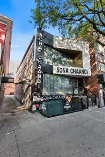 a view of street with sitting area