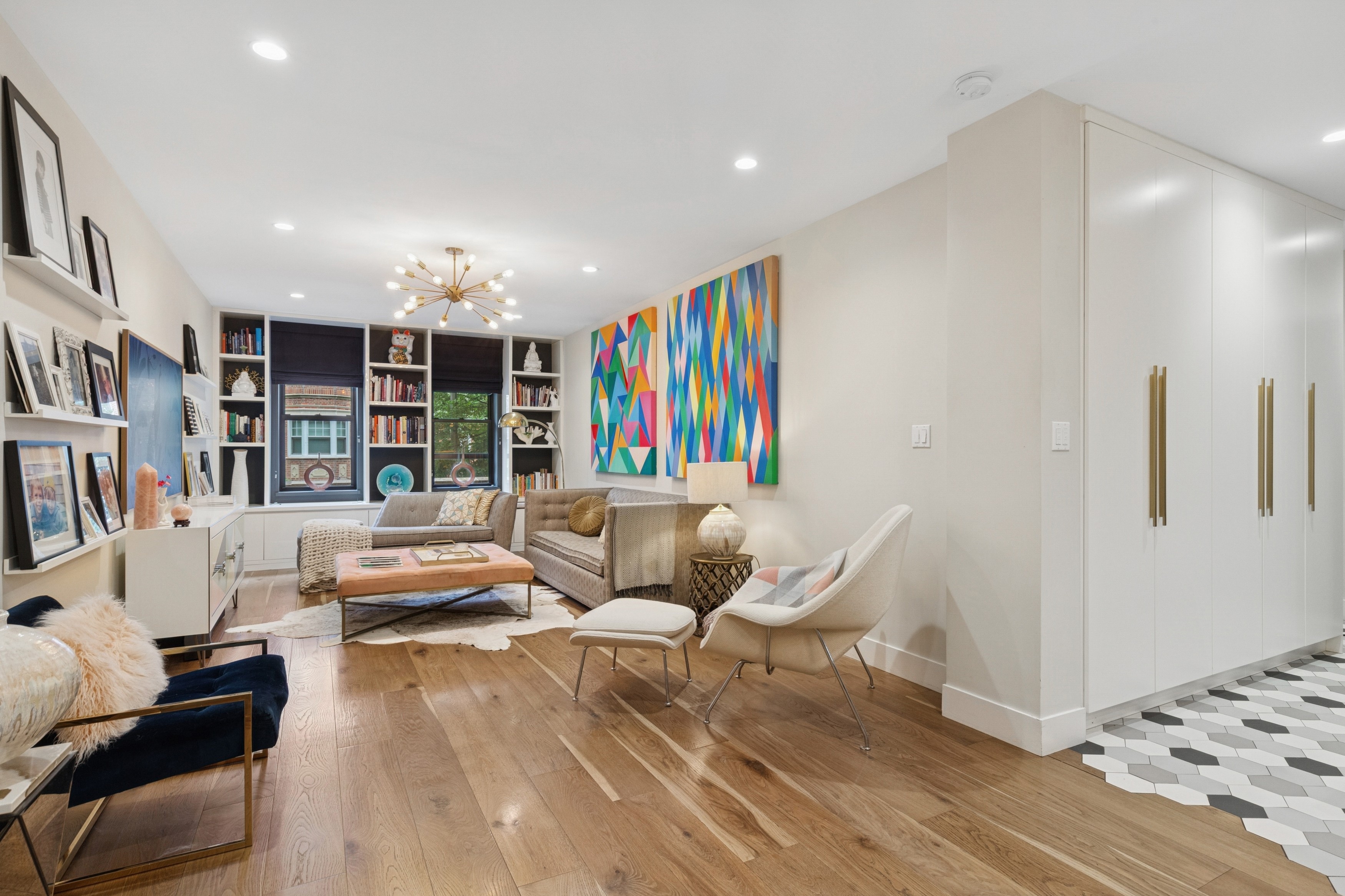 125 Cabrini Boulevard, Unit A22 Manhattan, NY 10033 - Photo 4 of 20 a living room with furniture and a flat screen tv