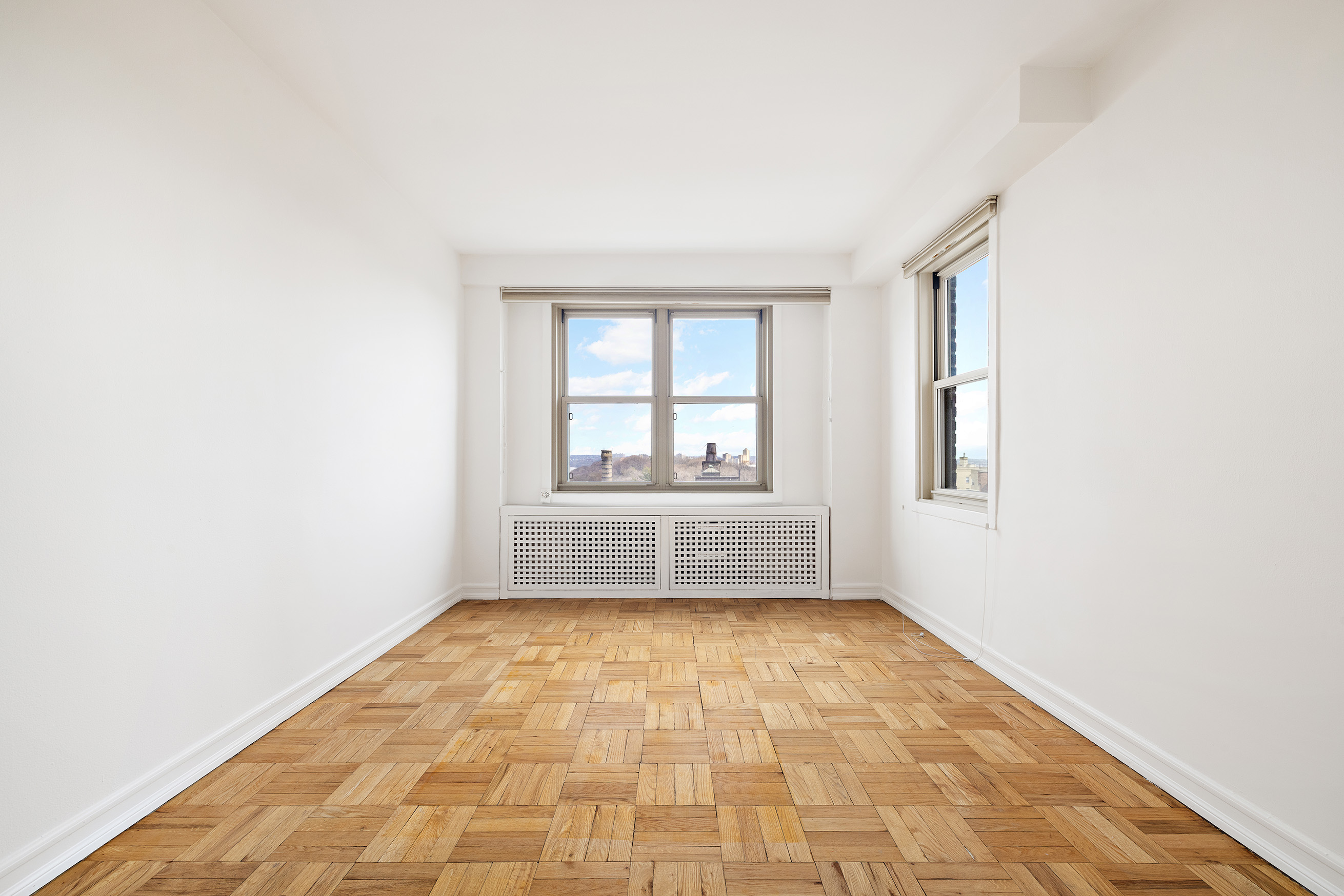 900 West 190th Street, Unit 10O Manhattan, NY 10040 - Photo 6 of 15 a view of an empty room with a window