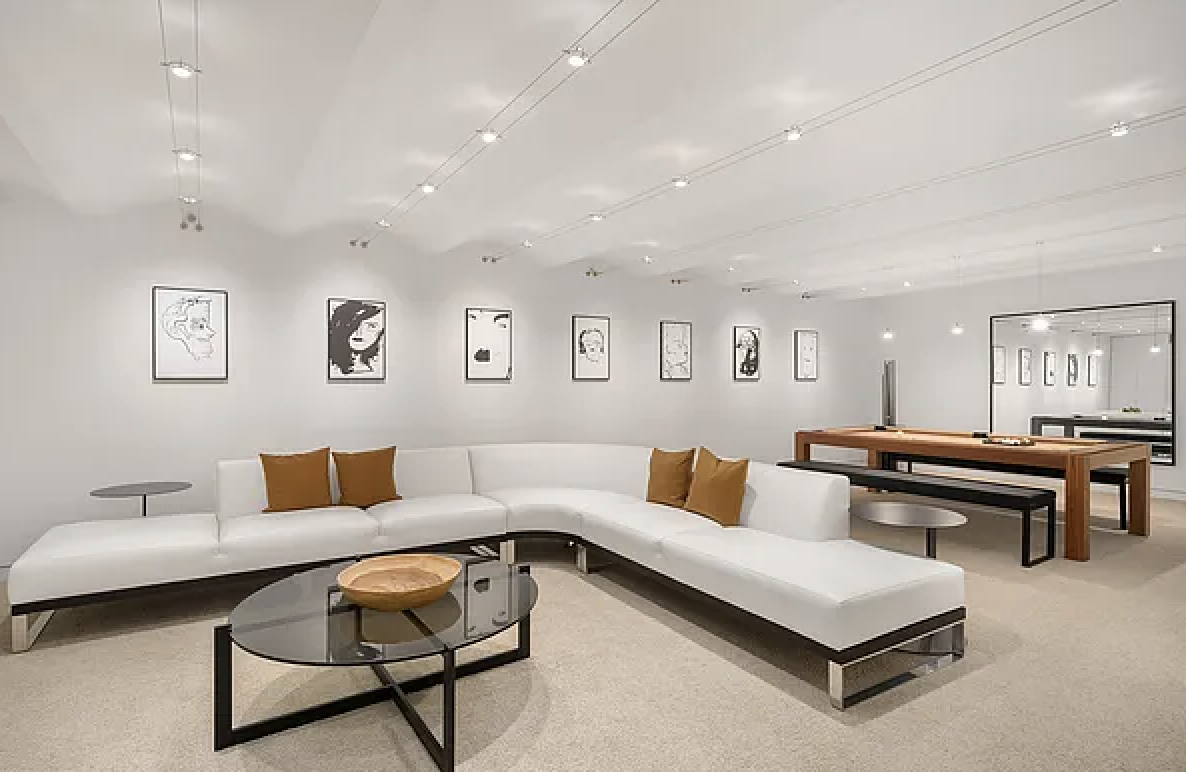 67-69 Franklin Street, Unit 2B Manhattan, NY 10013 - Photo 13 of 16 a living room with furniture and a rug
