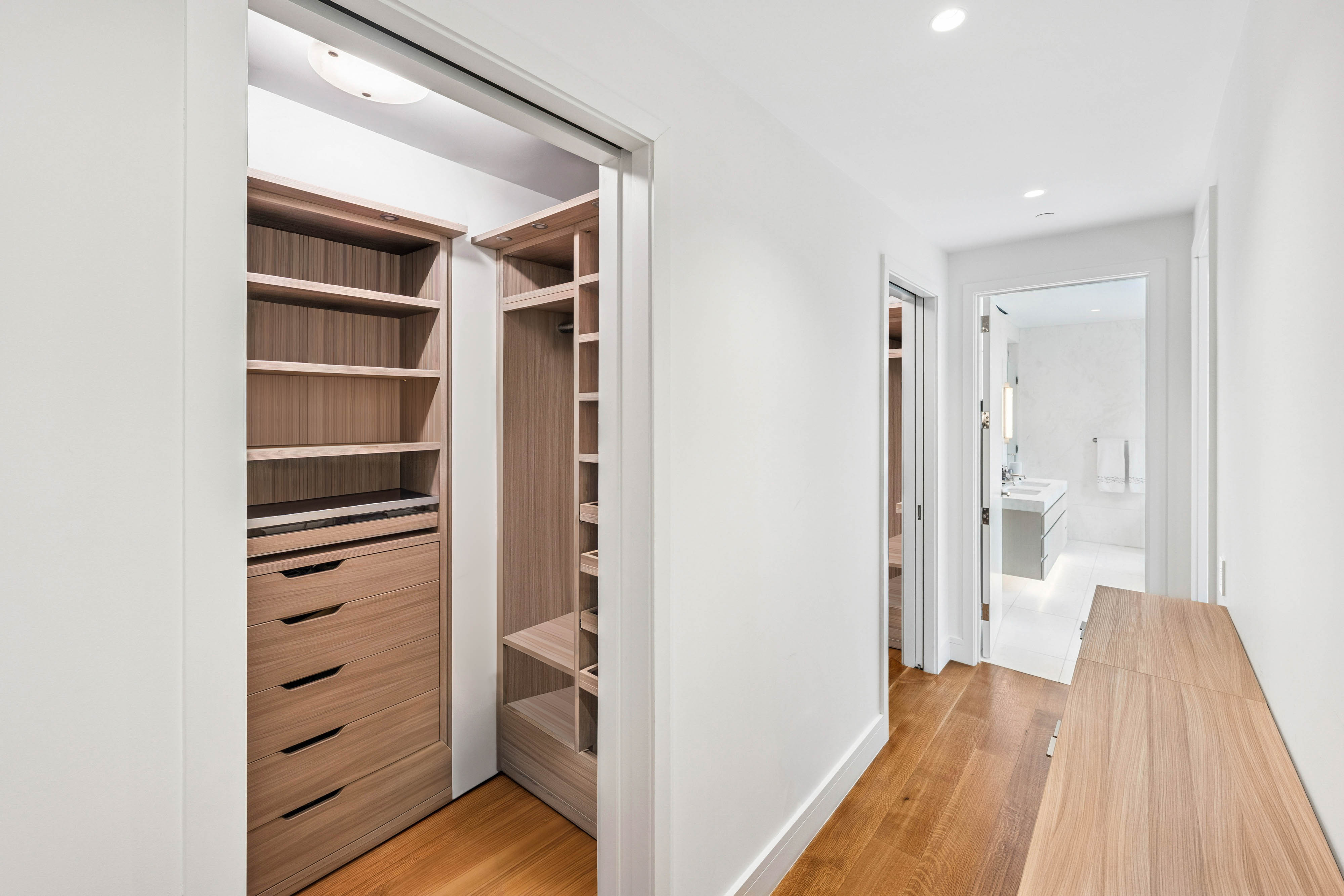 1228 Madison Avenue, Unit 11 Manhattan, NY 10128 - Photo 10 of 22 a view of walk in closet with empty racks