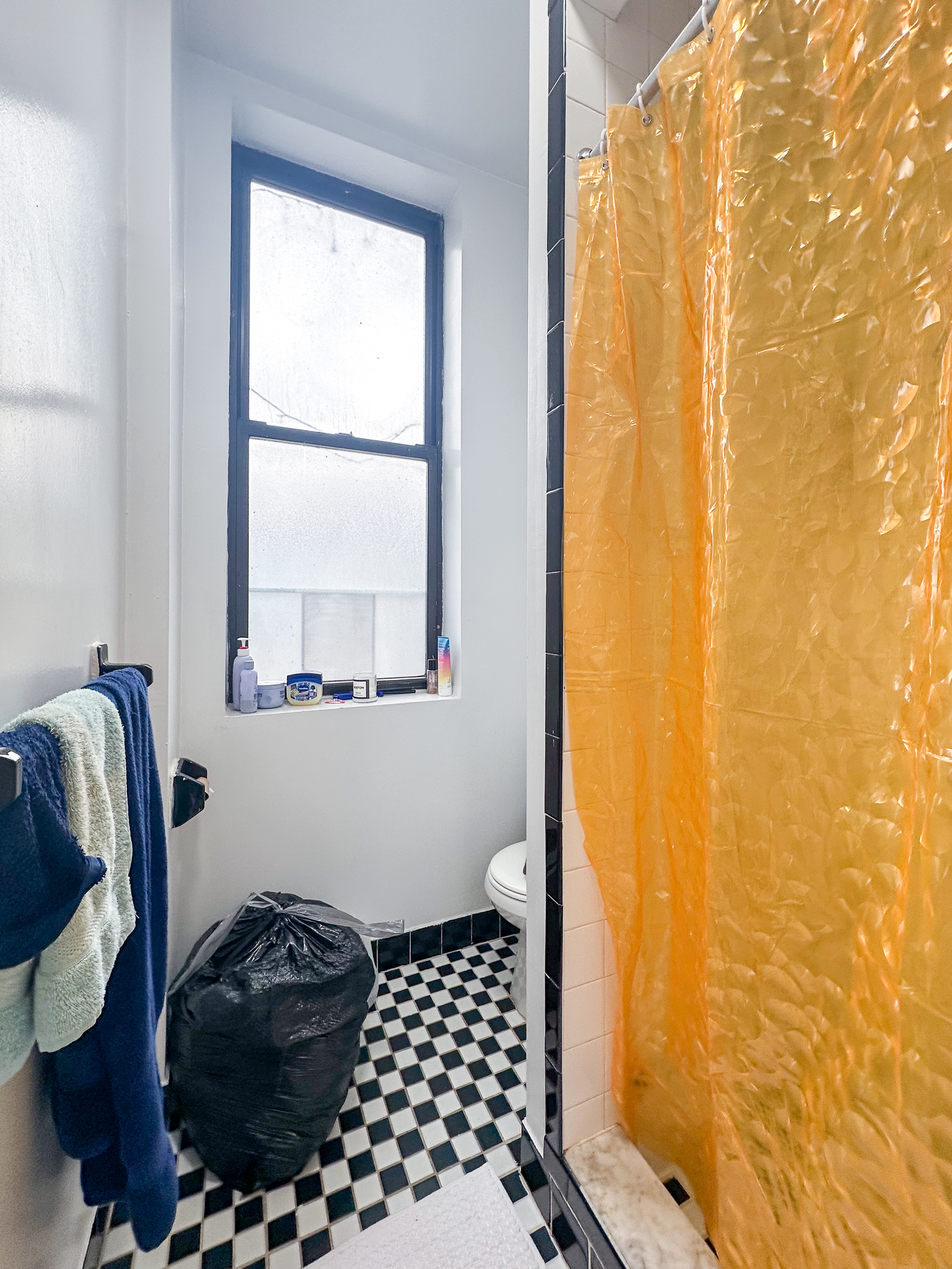 215 East 5th Street, Unit 7 Manhattan, NY 10003 - Photo 12 of 15 a bathroom with a bathtub and shower