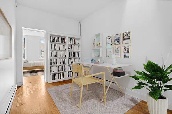 241 Himrod Street, Unit 3L Brooklyn, NY 11237 - Photo 4 of 5 a living room with furniture and wooden floor