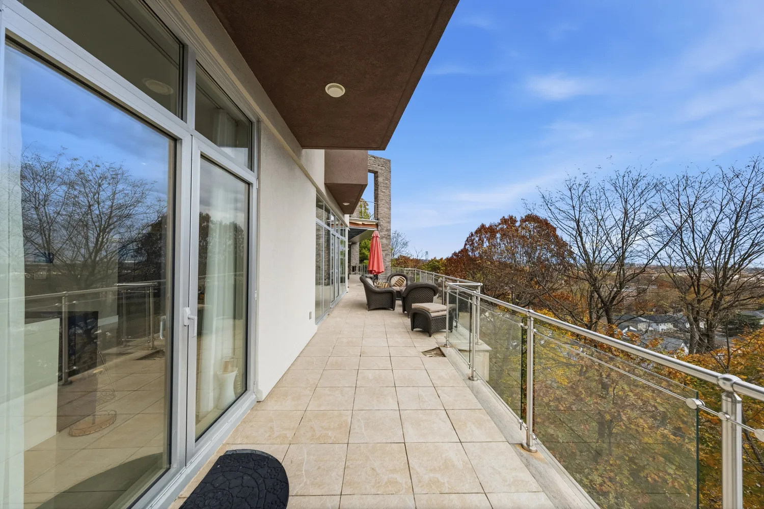 a view of balcony with furniture