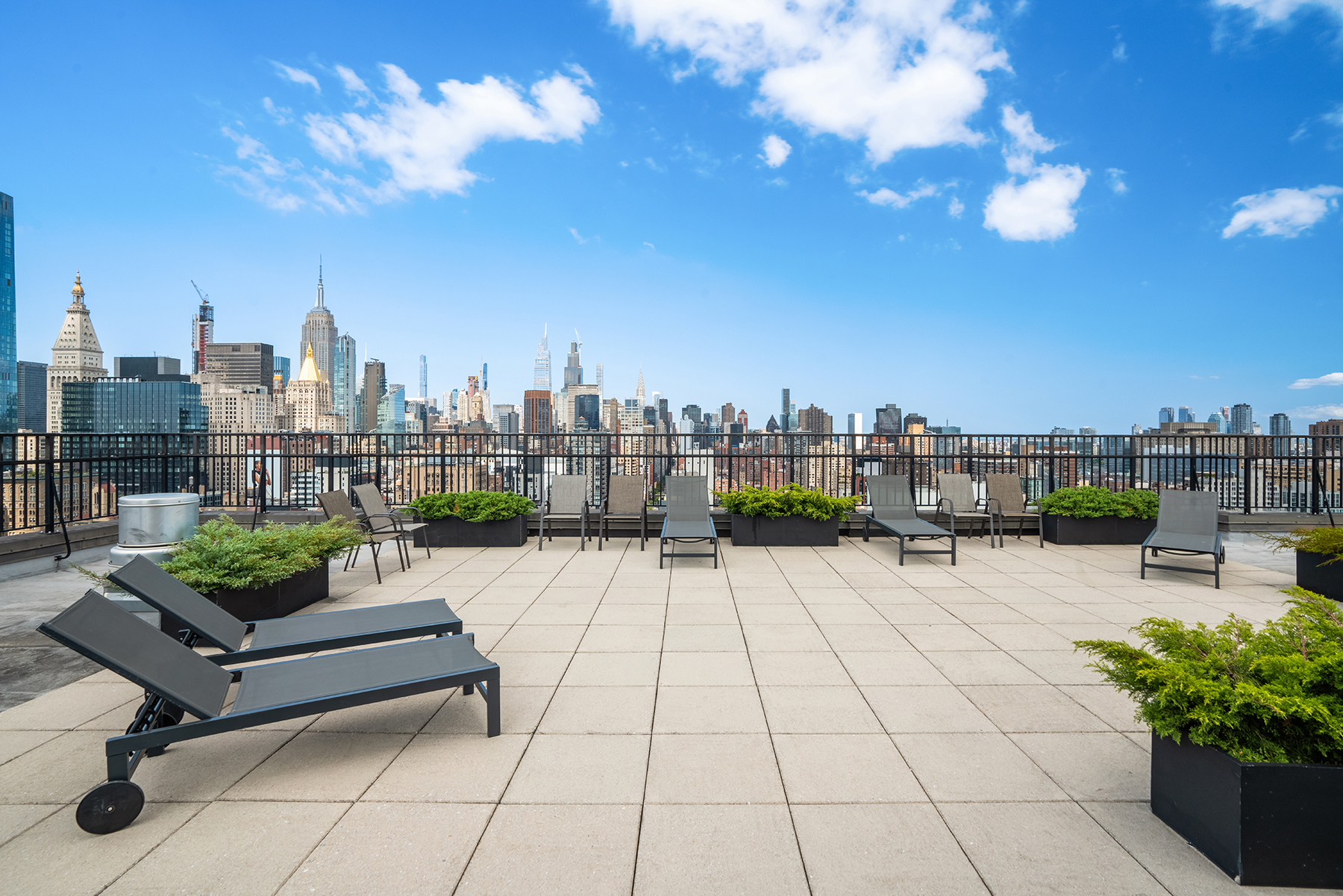 201 East 17th Street, Unit 16H Manhattan, NY 10003 - Photo 12 of 16 a view of a terrace with furniture