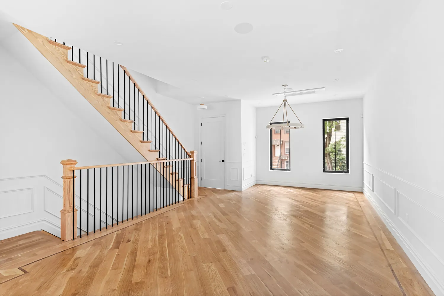 a view of a hallway with staircase