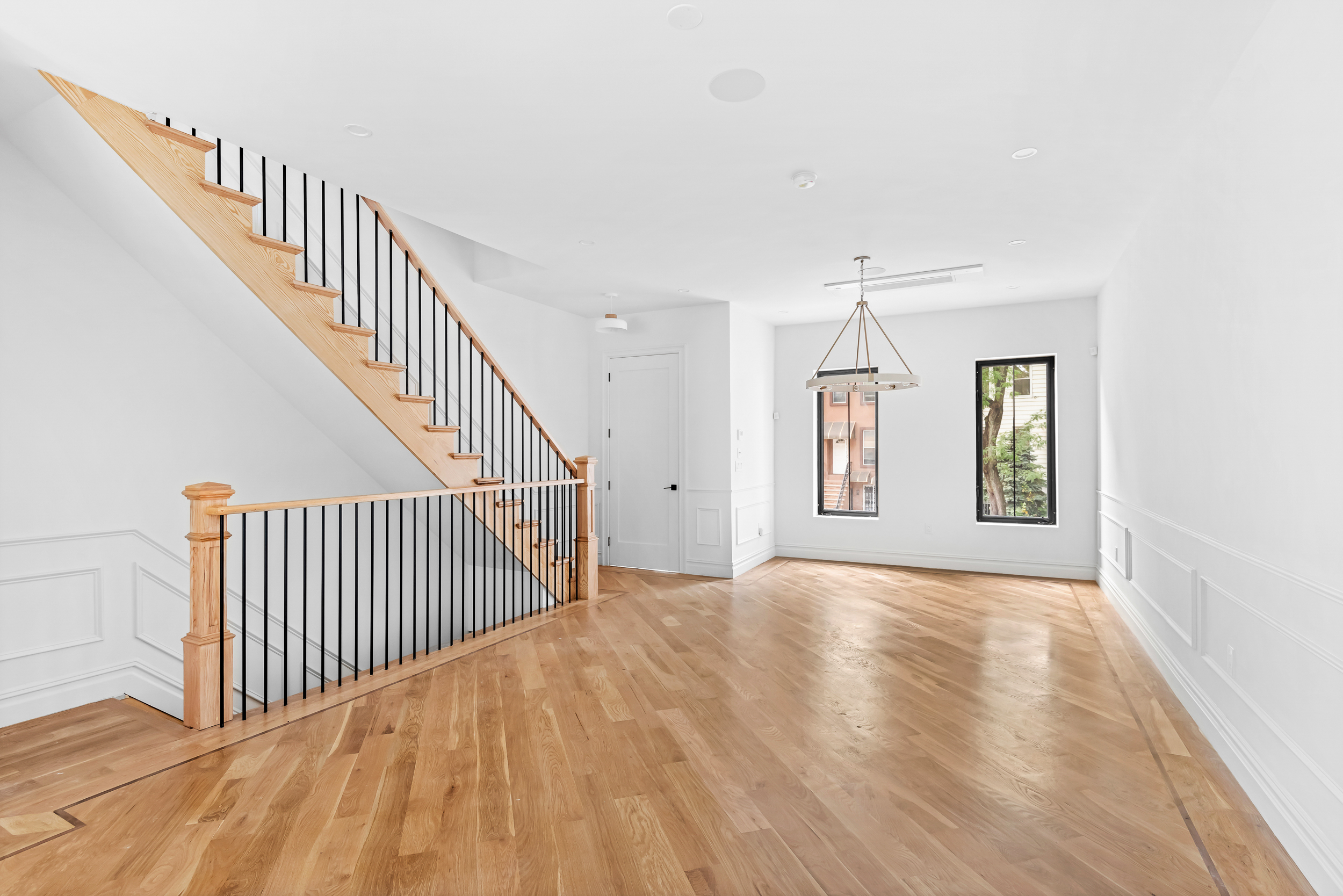 608 Van Buren Street Brooklyn, NY 11221 - Photo 4 of 10 a view of a hallway with staircase