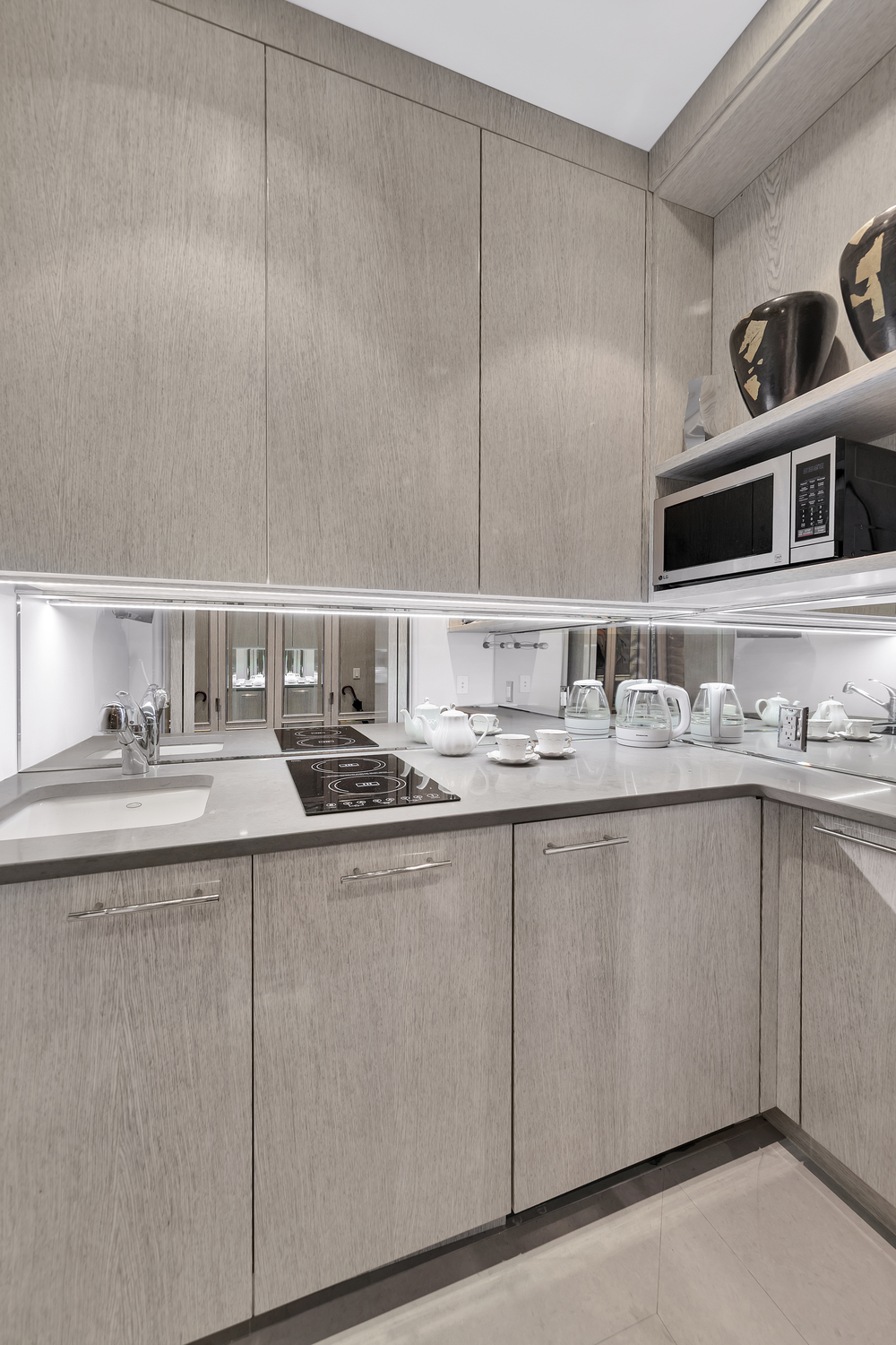 465 Park Avenue, Unit 9F Manhattan, NY 10022 - Photo 5 of 13 a bathroom with a sink and a mirror