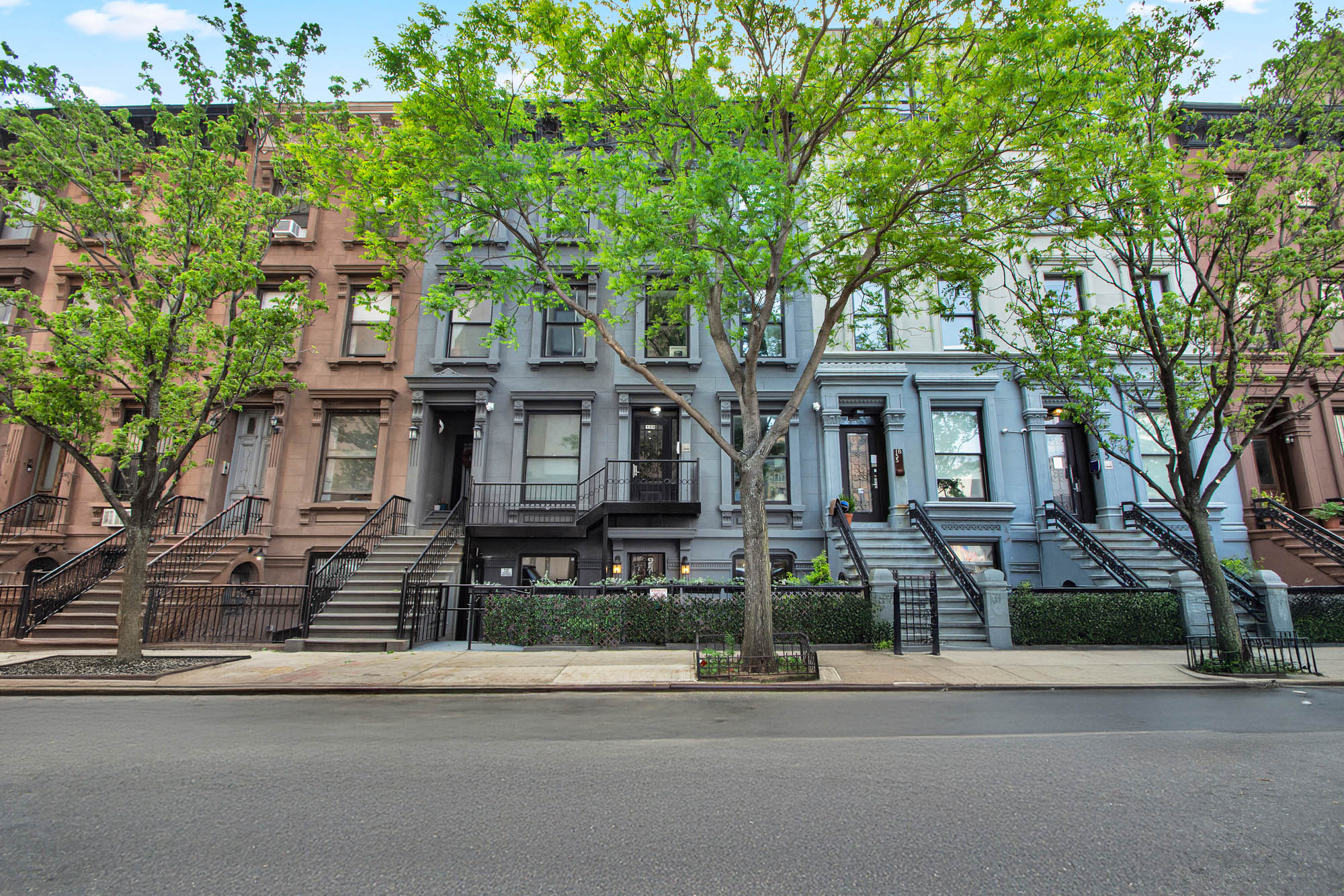 159 West 126th Street, Unit GARDEN A Manhattan, NY 10027 - Photo 14 of 15 front view of a house with a street