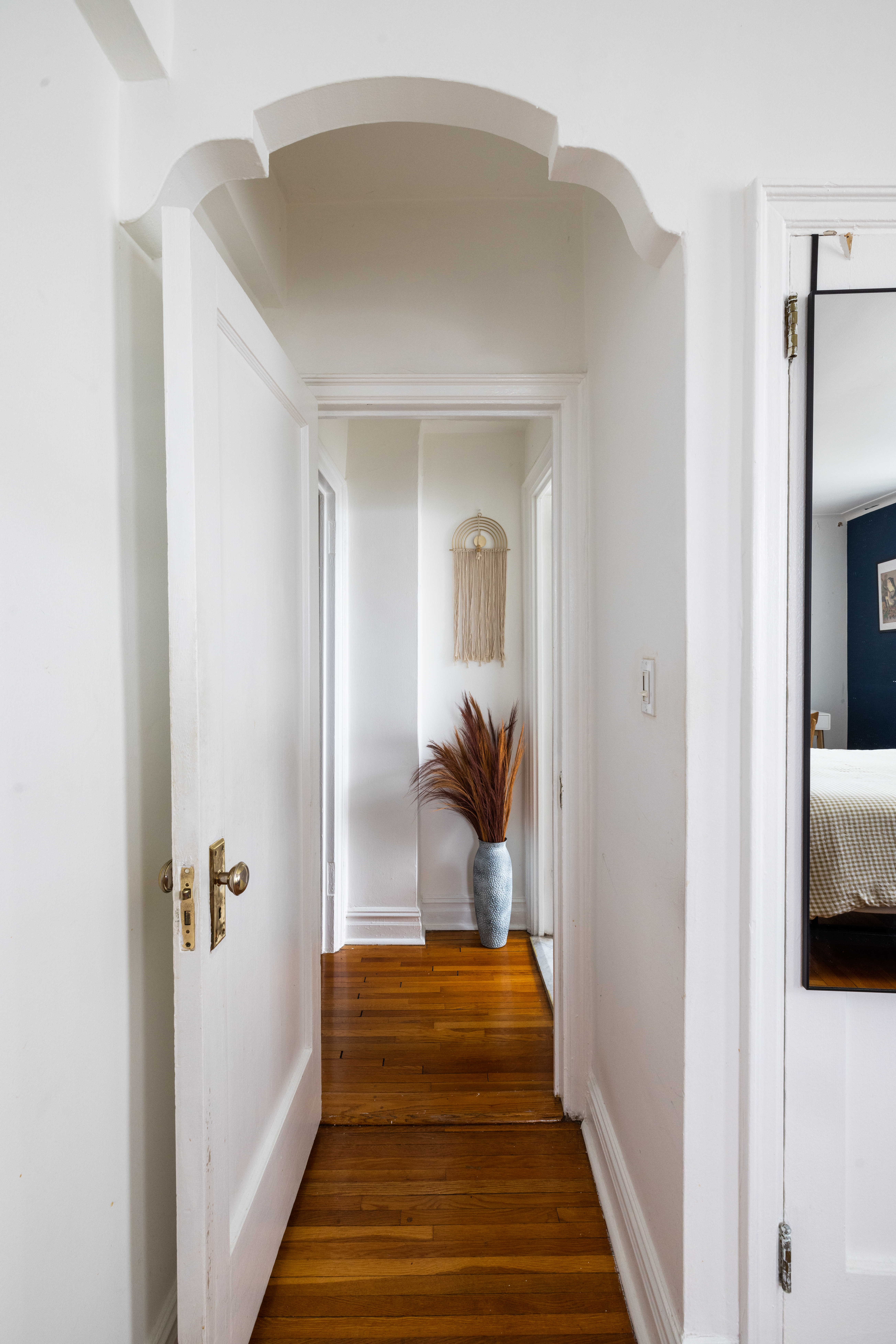 1680 Ocean Avenue, Unit 6D Brooklyn, NY 11230 - Photo 7 of 9 a view of a hallway with a livingroom and furniture