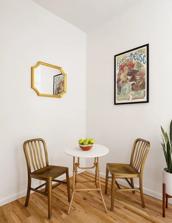 a view of a room with furniture and wooden floor