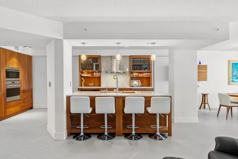 a room with furniture and flat screen tv