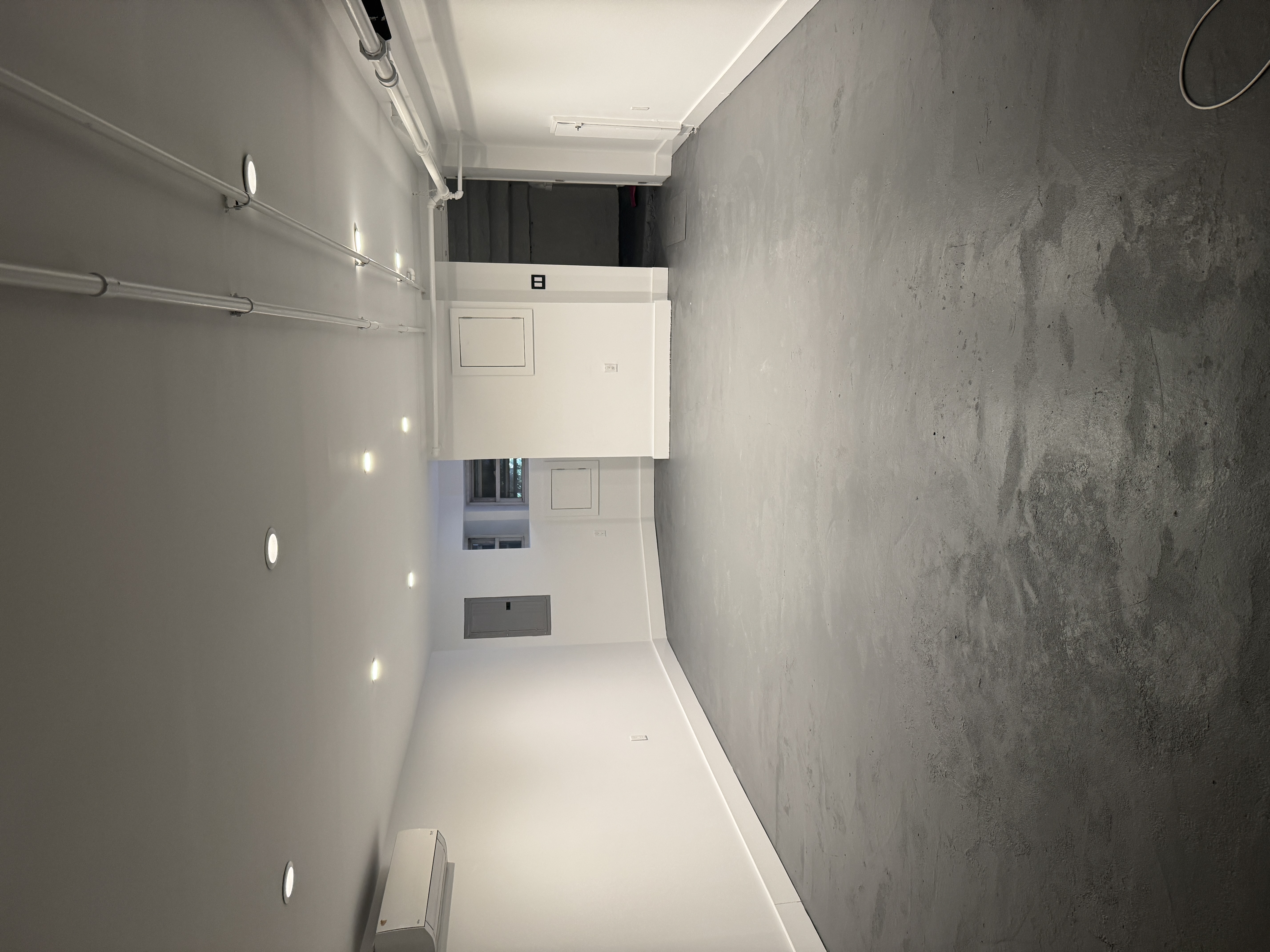 285 Empire Boulevard Brooklyn, NY 11225 - Photo 16 of 18 an empty room with windows and pillars in it