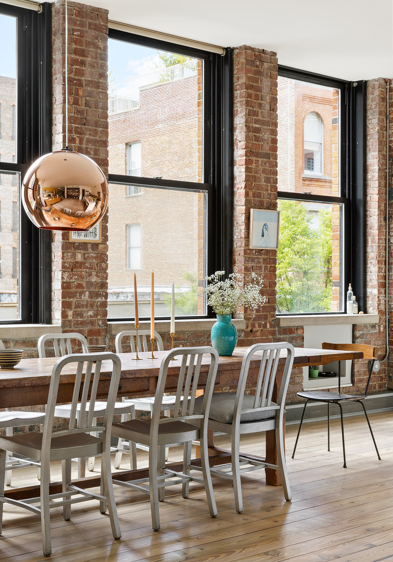525 West 22nd Street, Unit 3AF Manhattan, NY 10011 - Photo 8 of 25 a view of a dining room with furniture and a large window