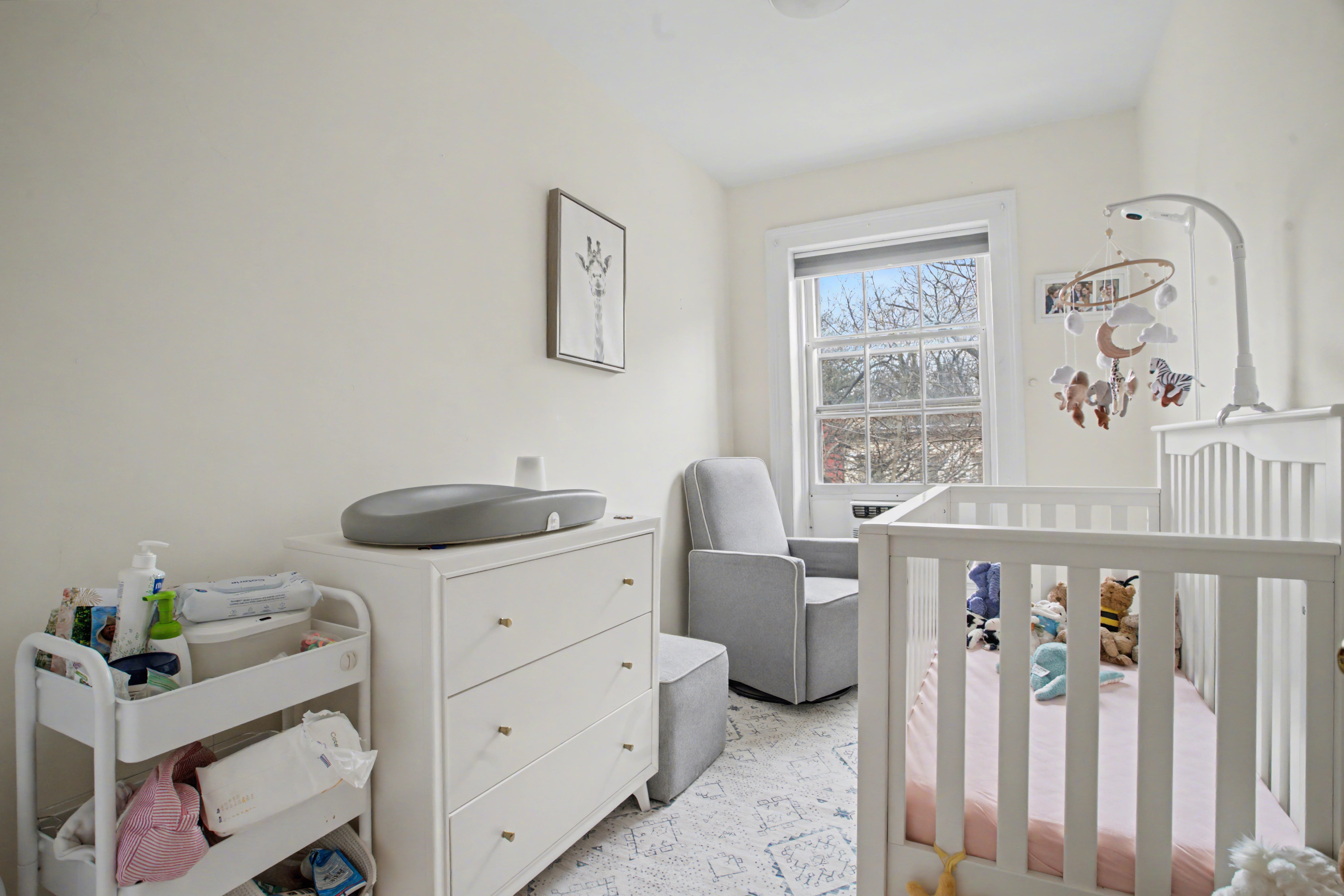 246 Cumberland Street, Unit 2 Brooklyn, NY 11205 - Photo 11 of 15 a bedroom with a bed and a window