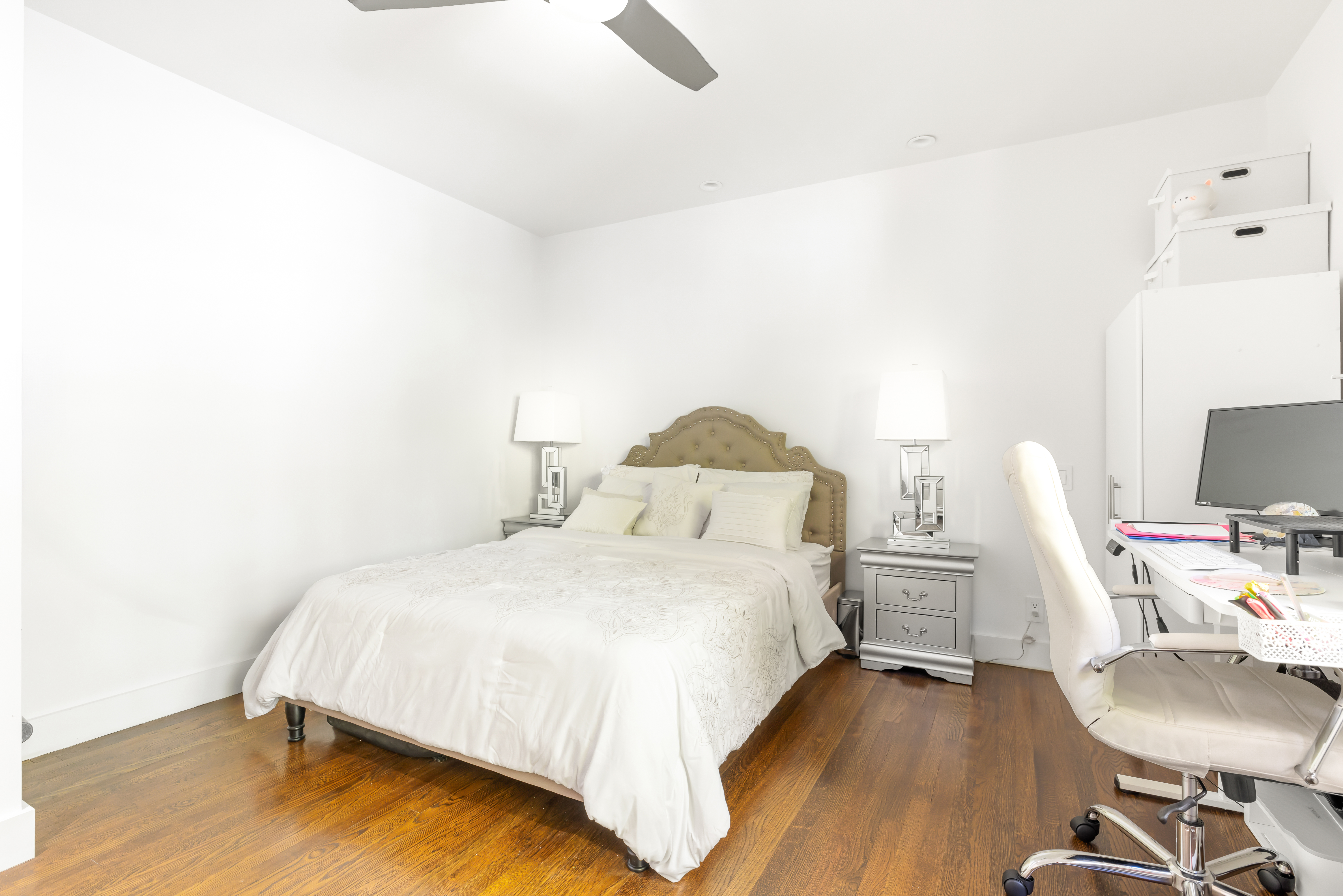 1490 Beacon Street, Unit 4 Brookline, MA 02446 - Photo 13 of 20 a bedroom with a bed and a chair